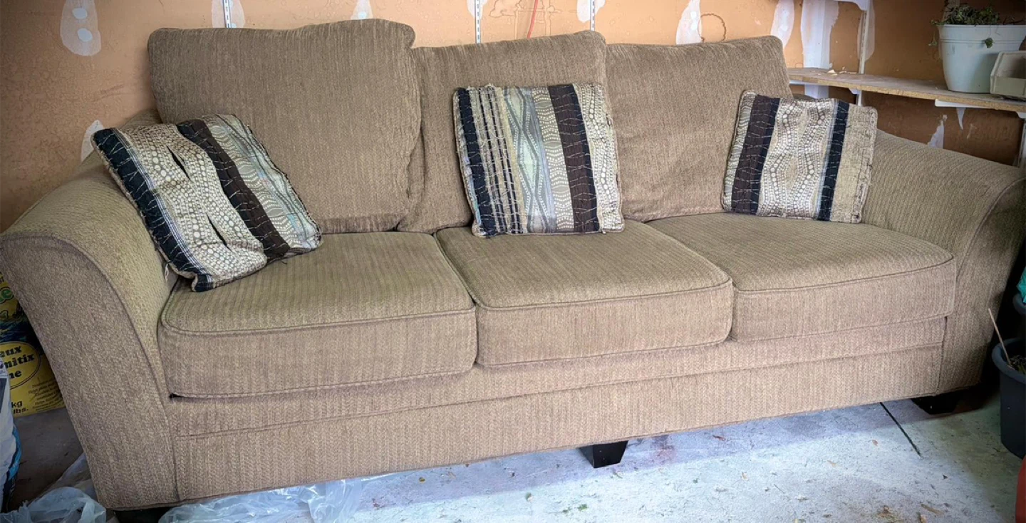 Tan Sofa with Decorative Pillows and solid wood dining table - photo 3