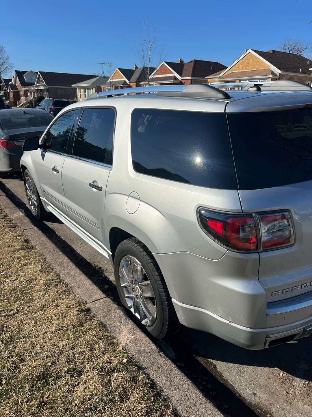 Silver GMC Acadia Denali SUV