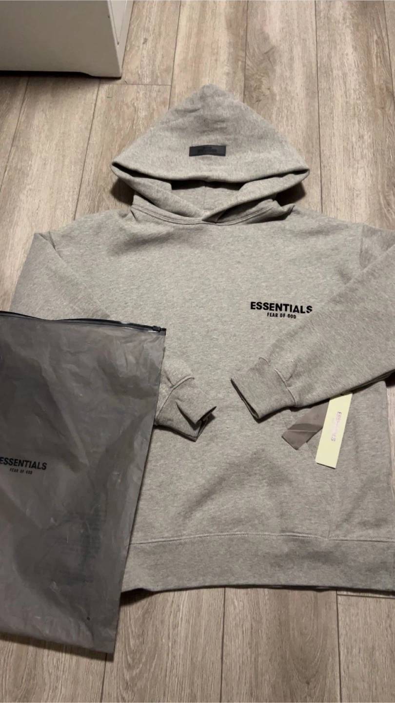 REAL ESSENTIALS HOODIE brand new never used