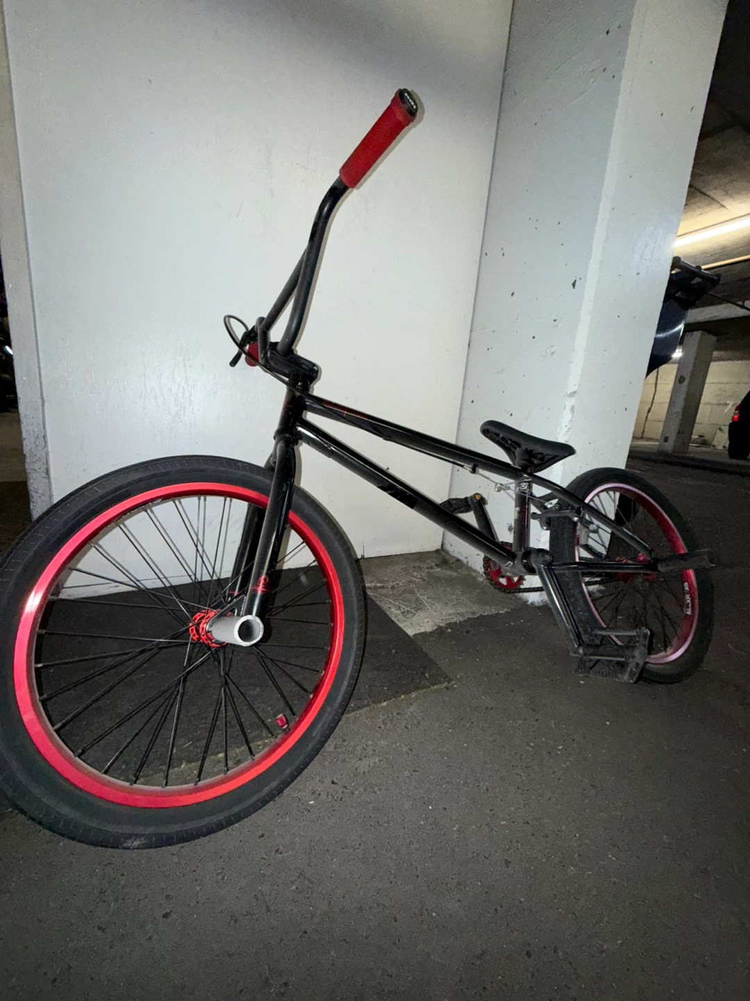 Black BMX Bike with Red Accents