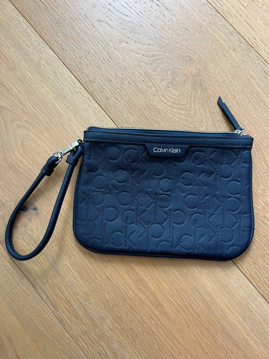 Calvin Klein Navy Embossed Logo Wristlet Pouch