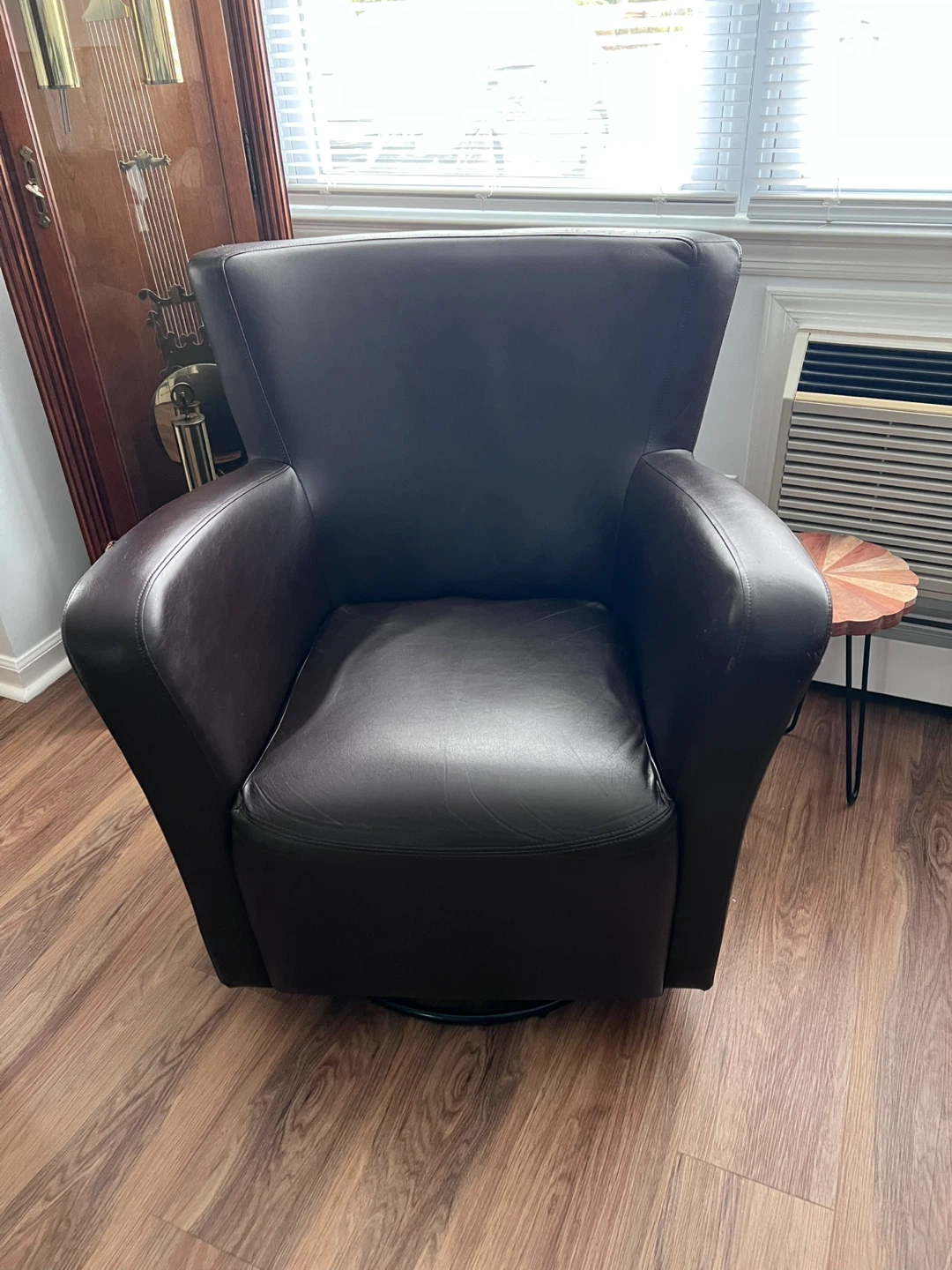 $30 brown leather swivel chair