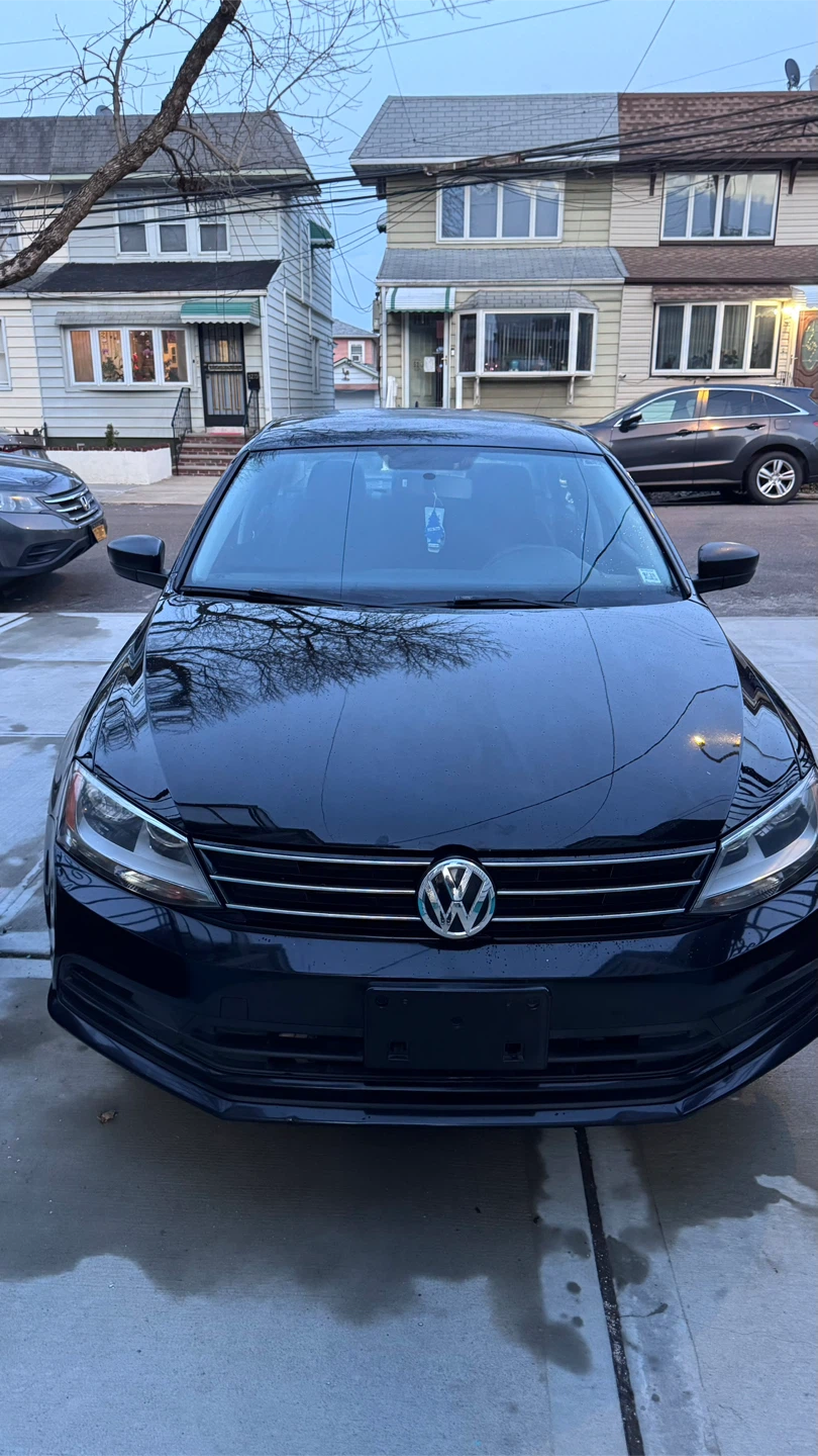 Black Volkswagen Jetta Sedan 2015 - photo 4