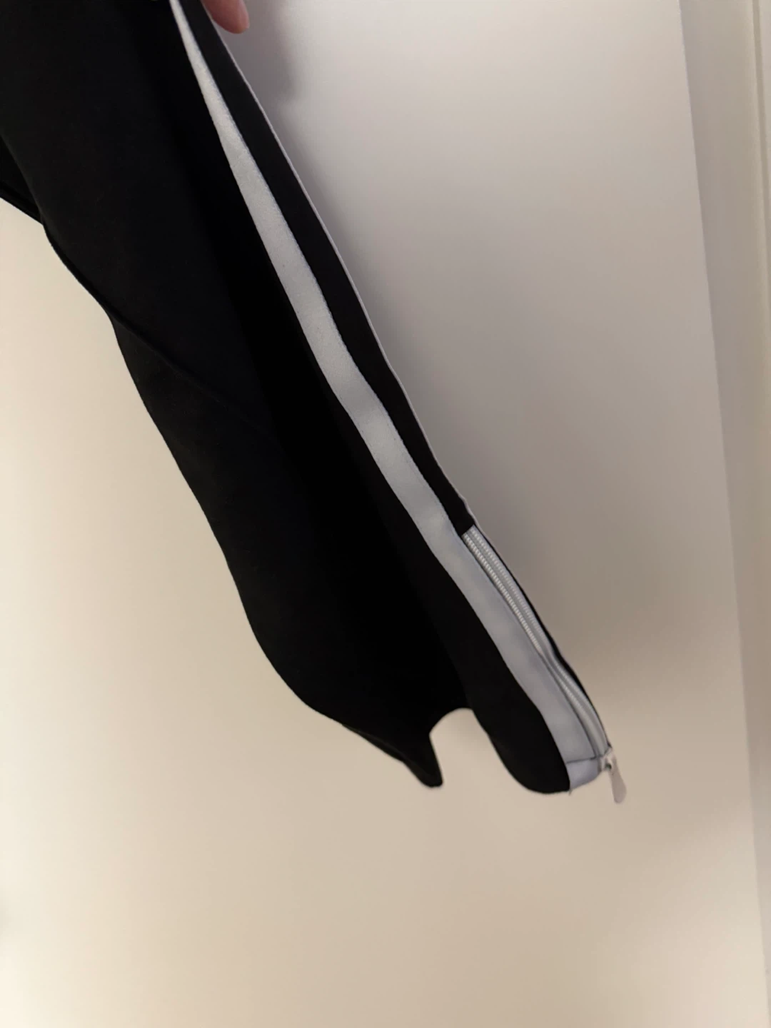 Black track pants with Palm Angels style and side stripe design. - photo 3