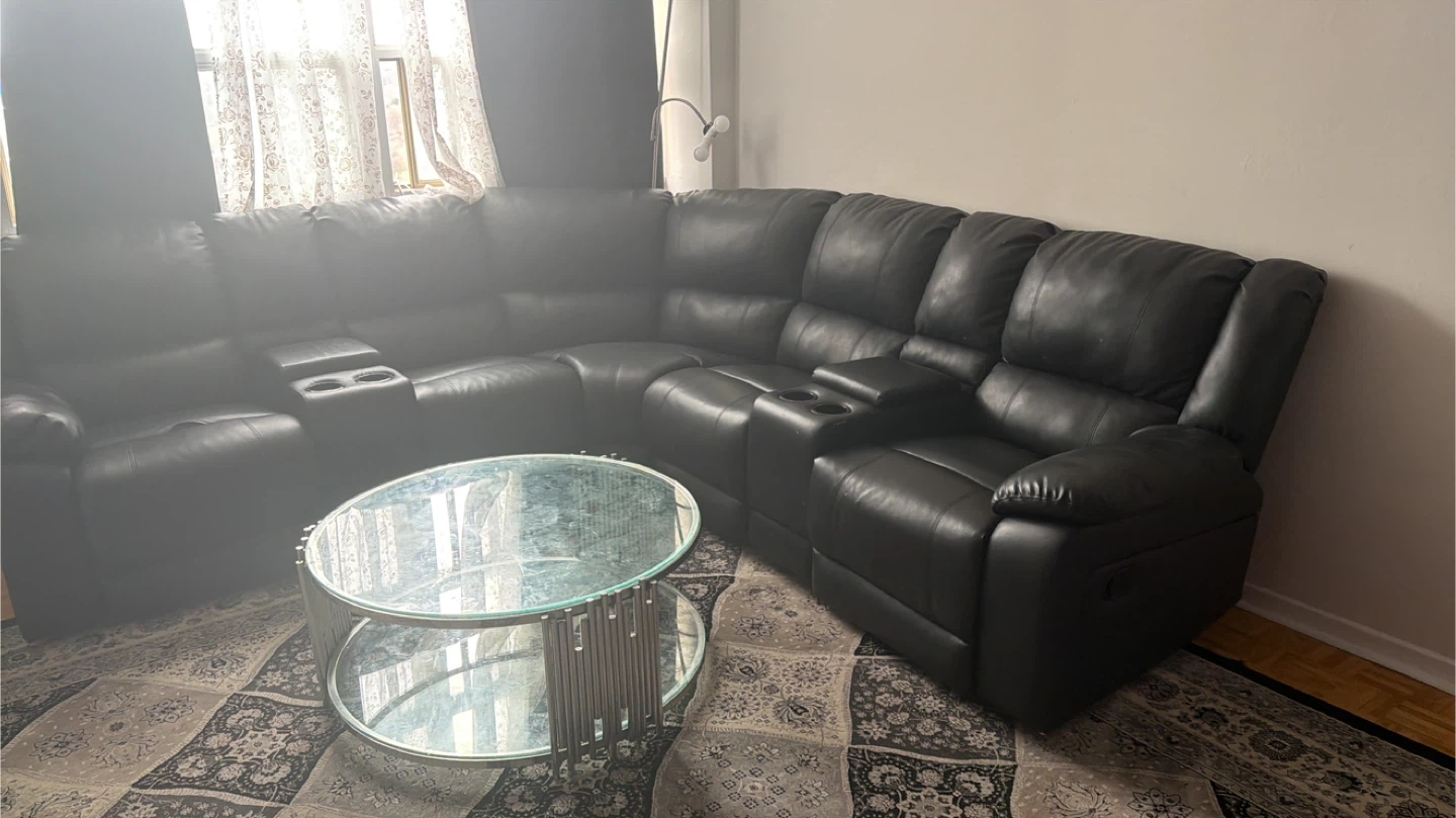 Black Leather Sectional Sofa with Recliners and Cup Holders