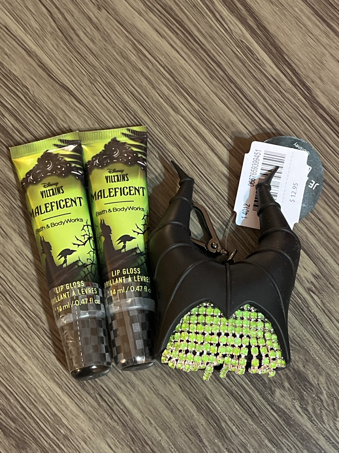 Bath & Body Works Maleficent Lip Gloss and pocket back holder