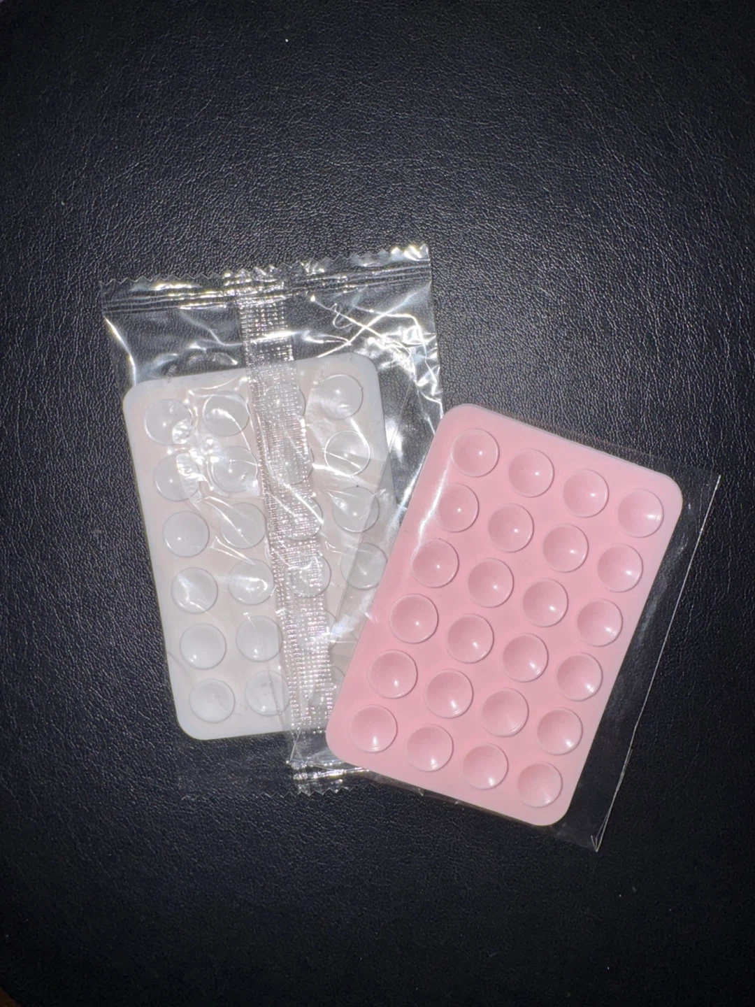 2 Phone case suction cup stick ons (off brand “octobuddy”)