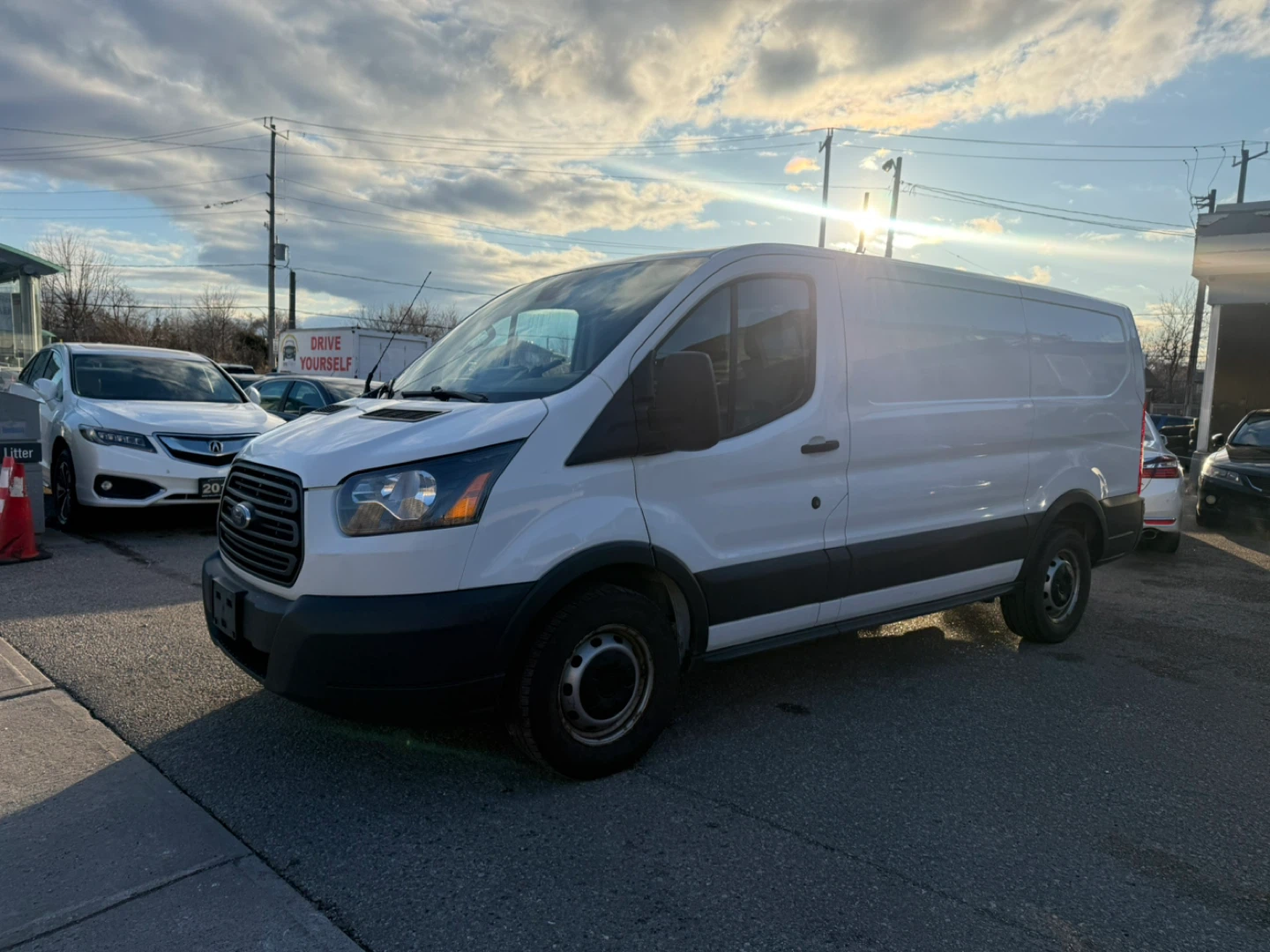 White Ford Transit Van