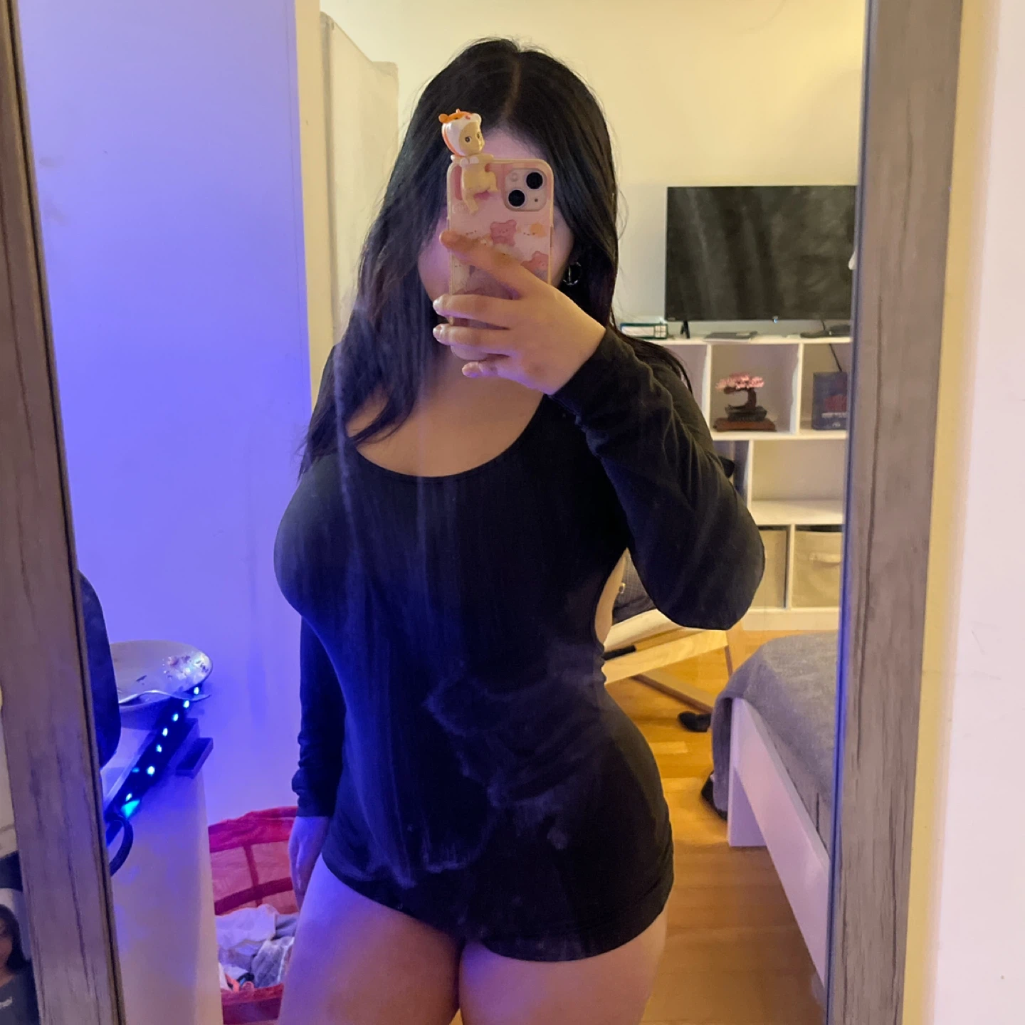 Black long-sleeve open-back romper