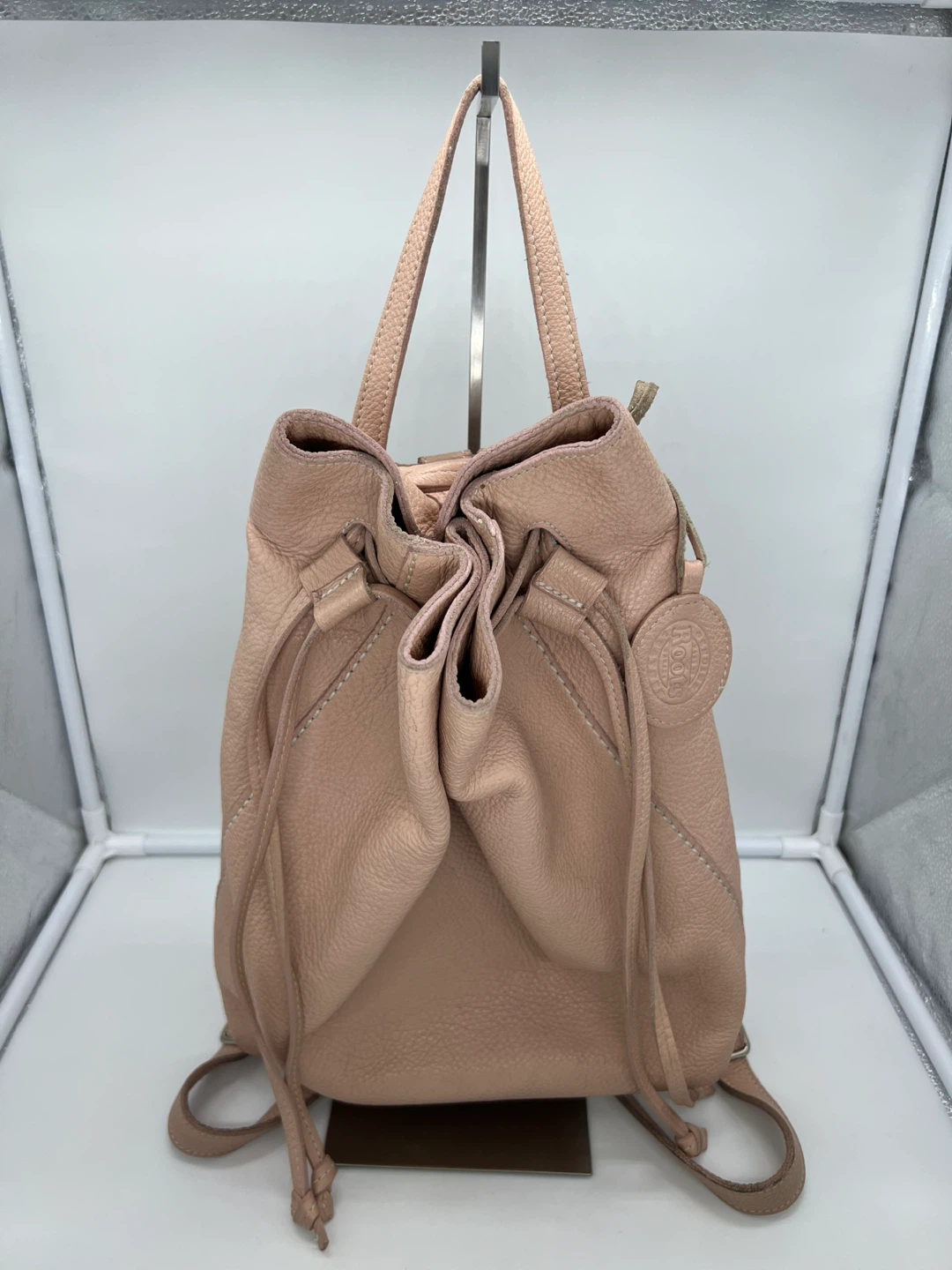 ROOTS Blush Pink Pebbled Leather Drawstring Backpack
