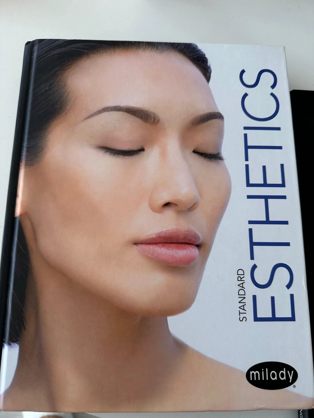 Milady Standard Foundations and Esthetics Fundamentals Textbooks