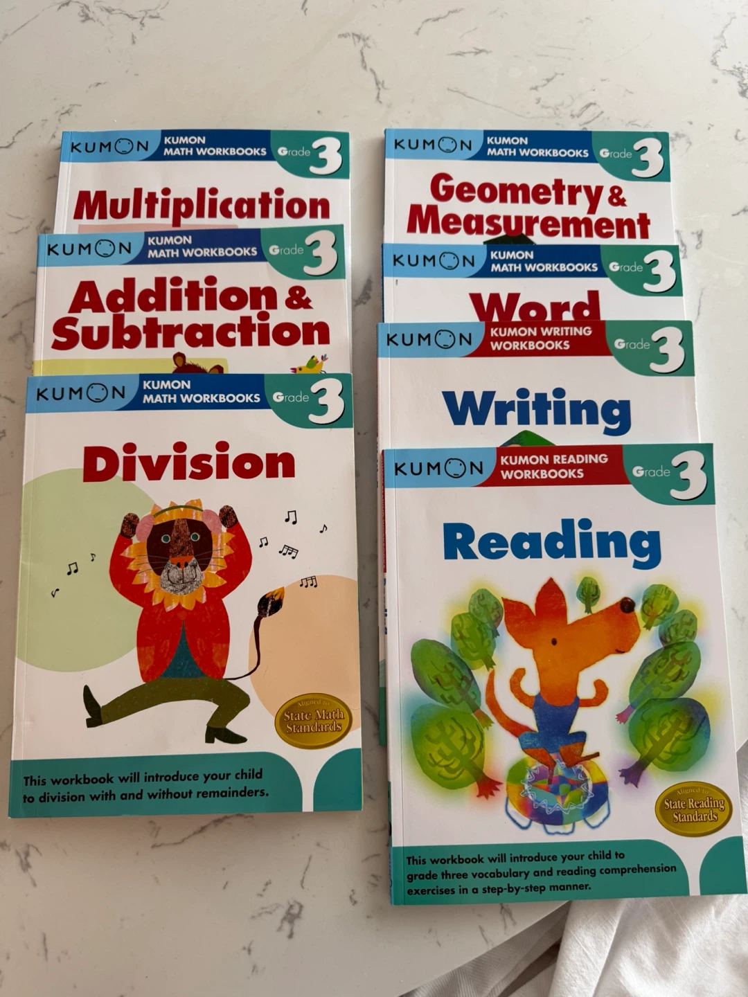 Kumon Grade 3 Math and Reading Workbooks - Set of 7