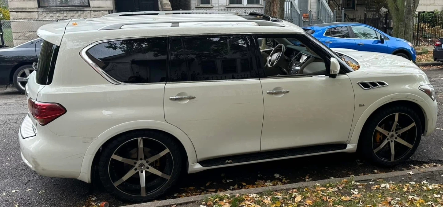 White Infiniti QX80 SUV - photo 5