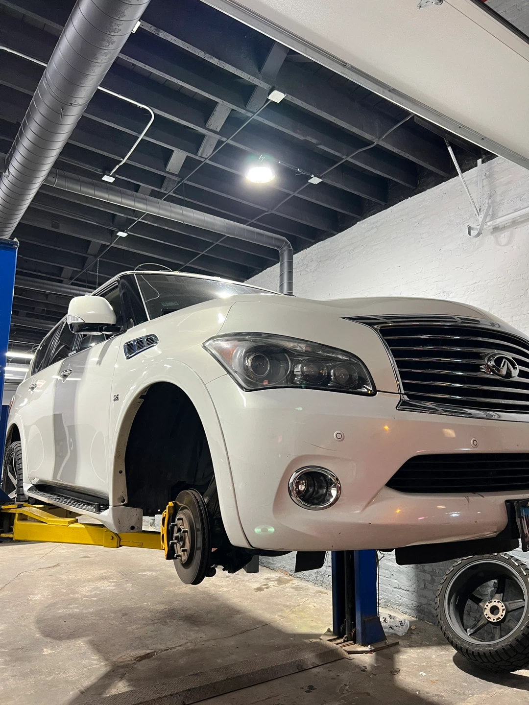 White Infiniti QX80 SUV