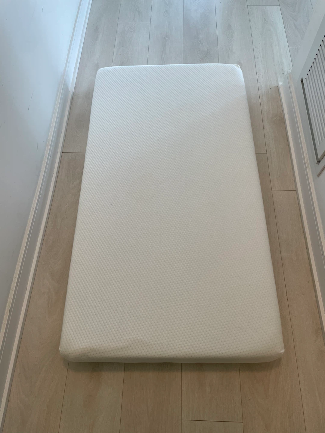 White baby mattress