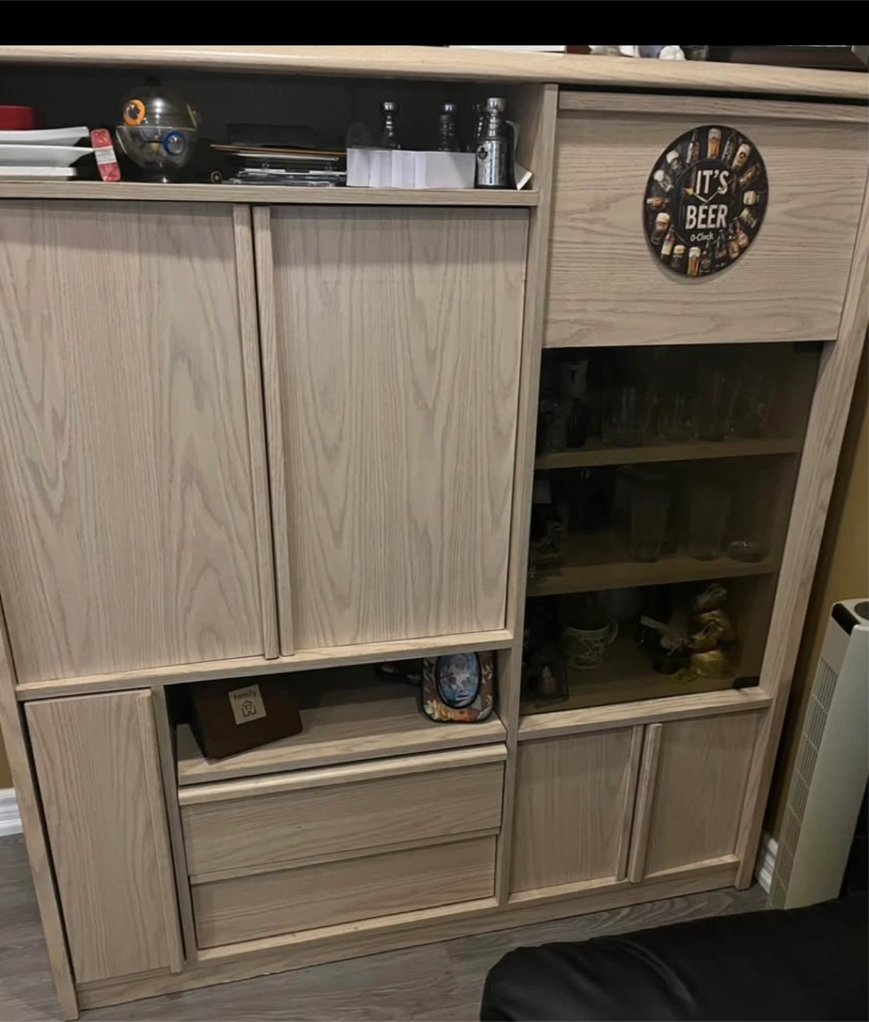 Light Wood Bar Cabinet with Glassware and Liquor Bottles - photo 3