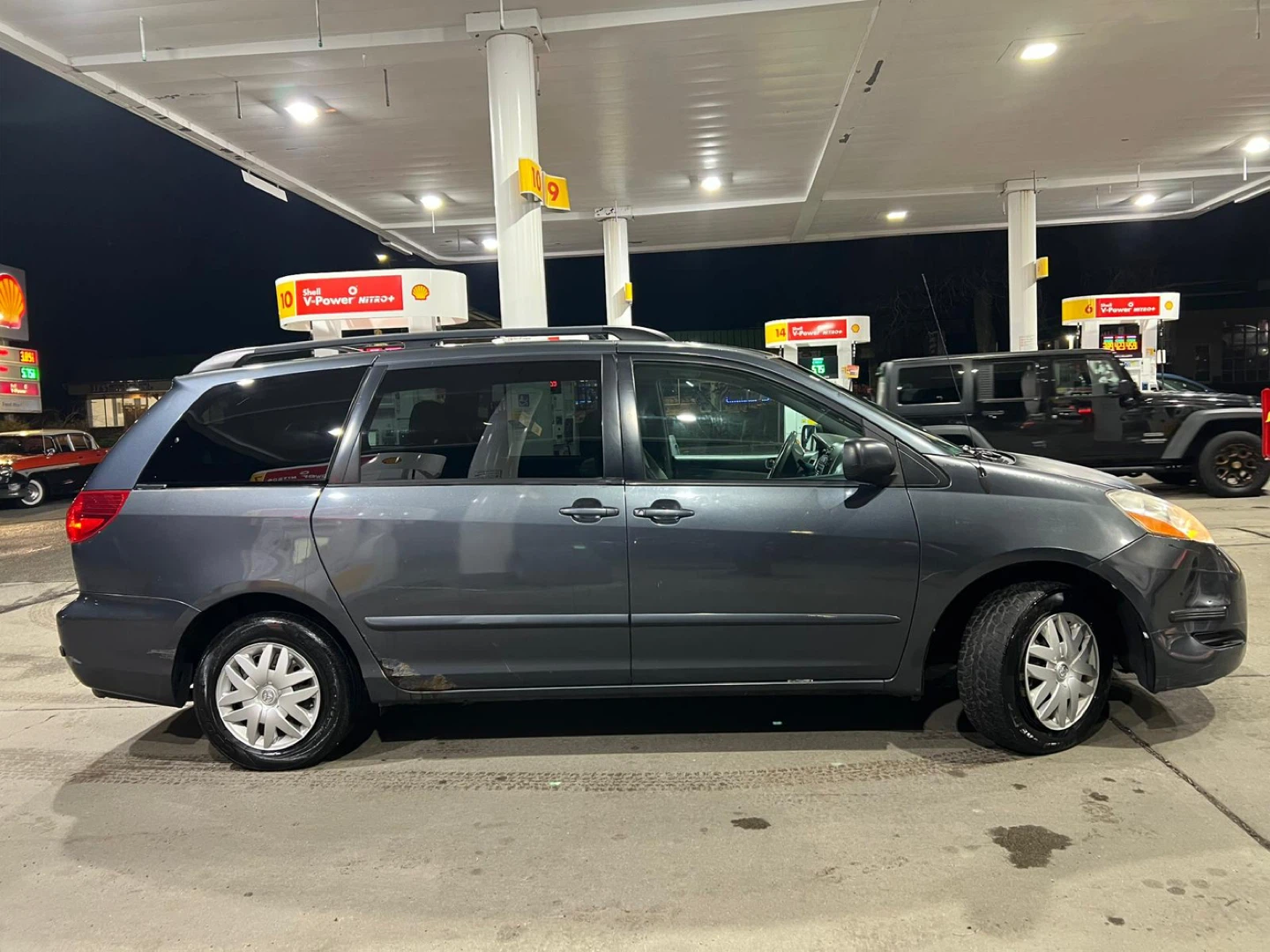 Gray Toyota Sienna Minivan