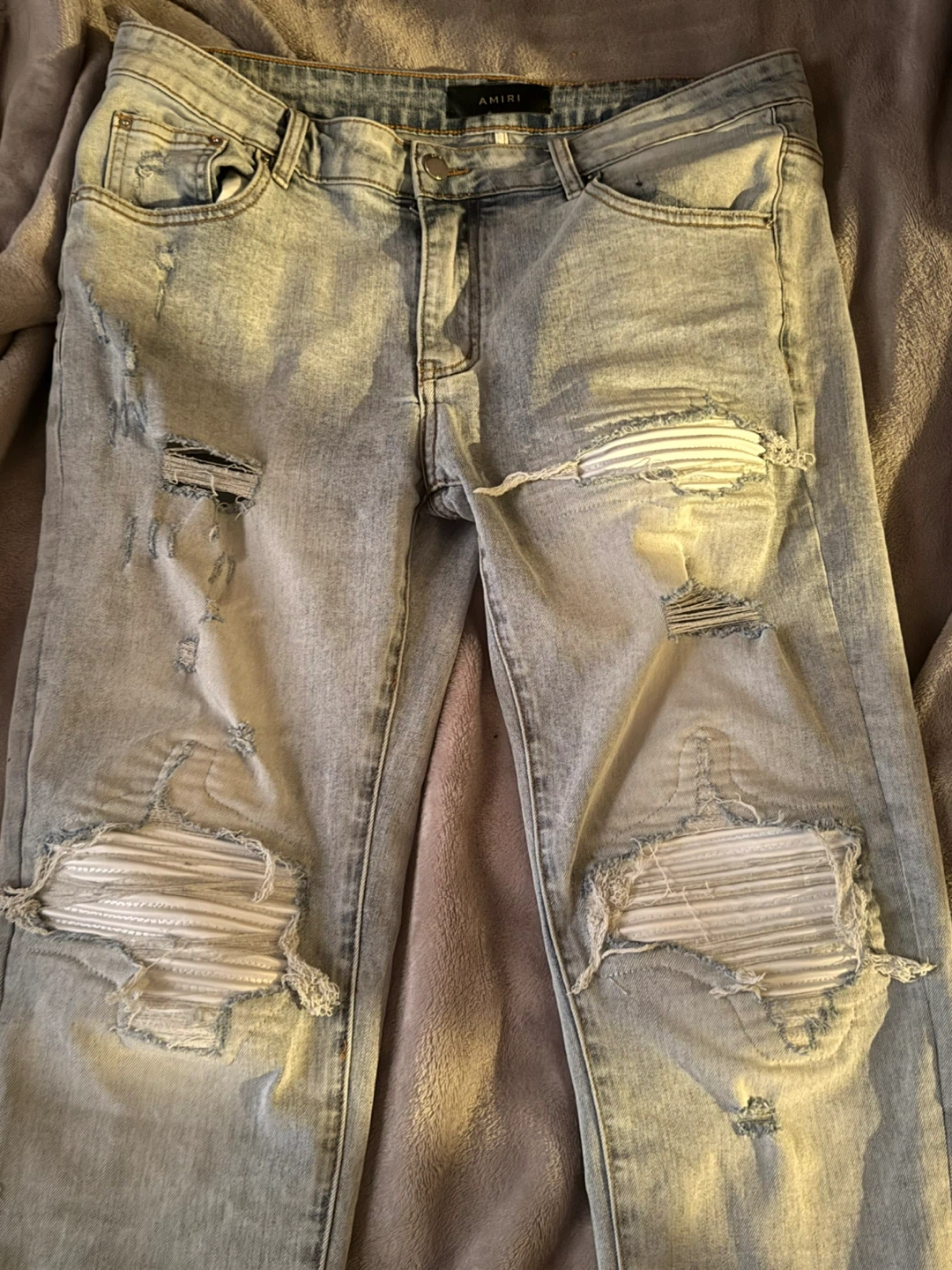 Amiri Light Wash Distressed Jeans