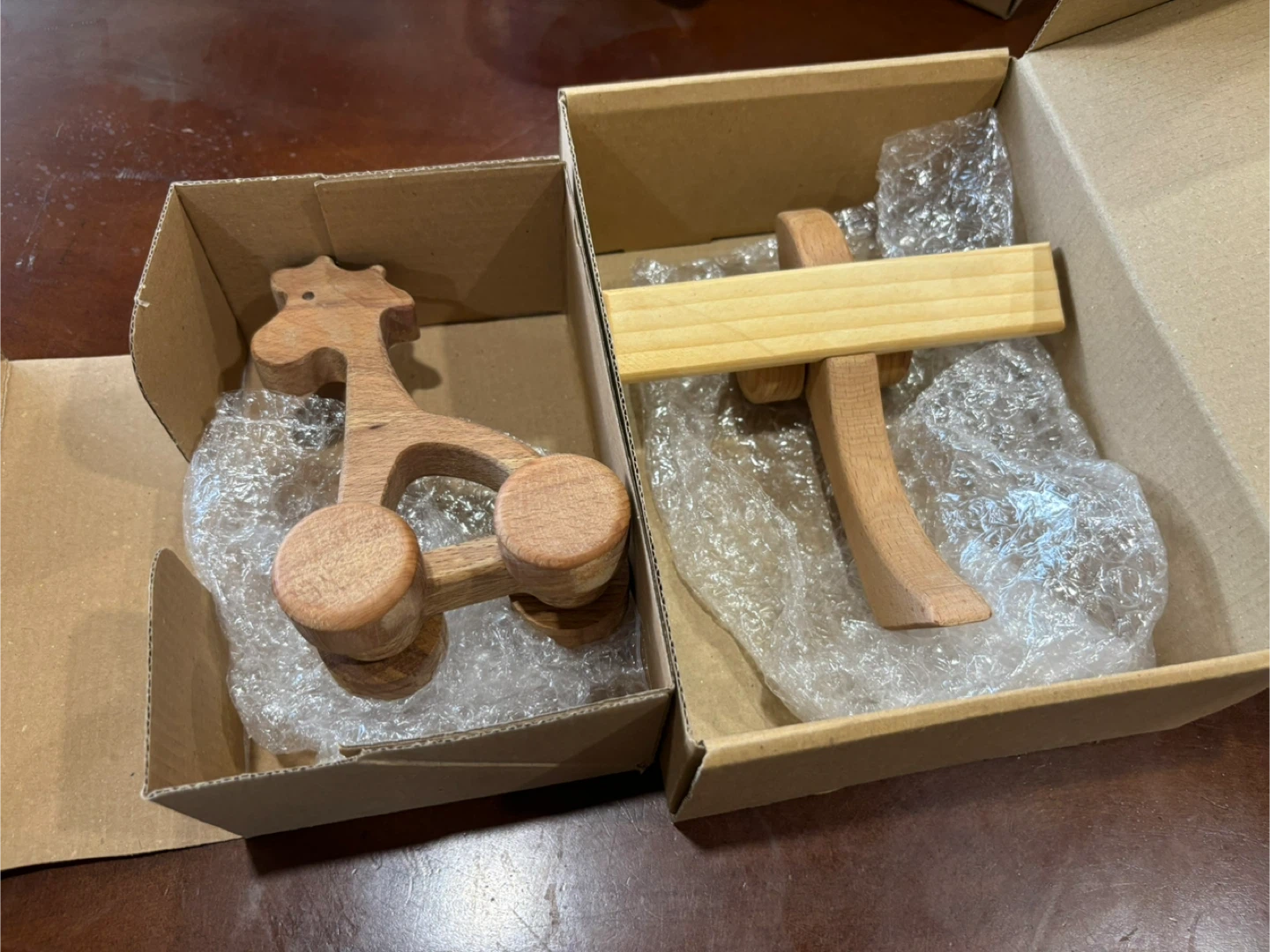 Wooden Giraffe and wooden plane