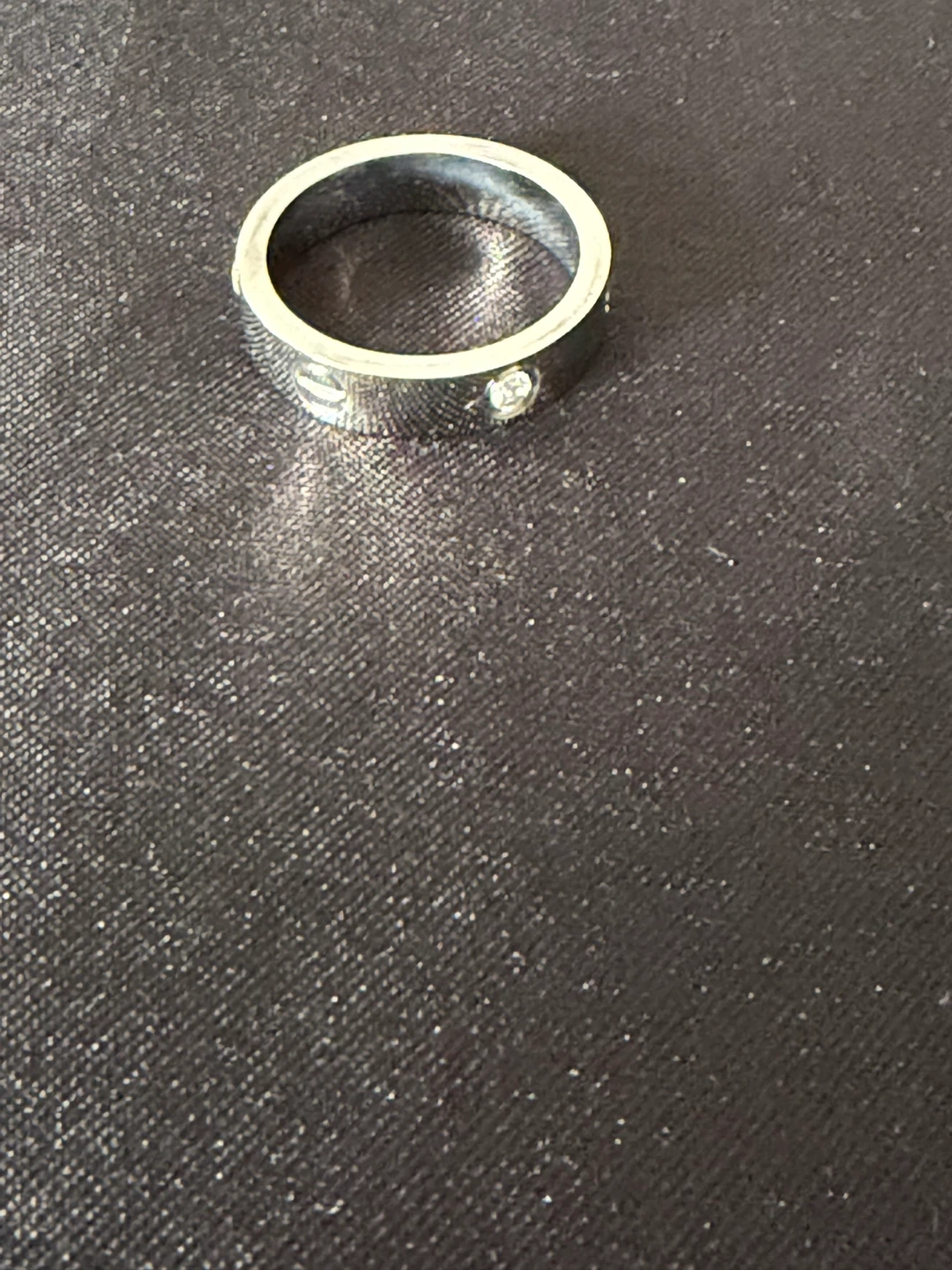 Silver band ring with stones