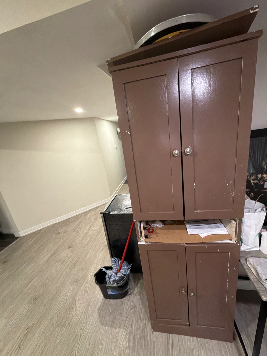 Brown two-tiered storage cabinet