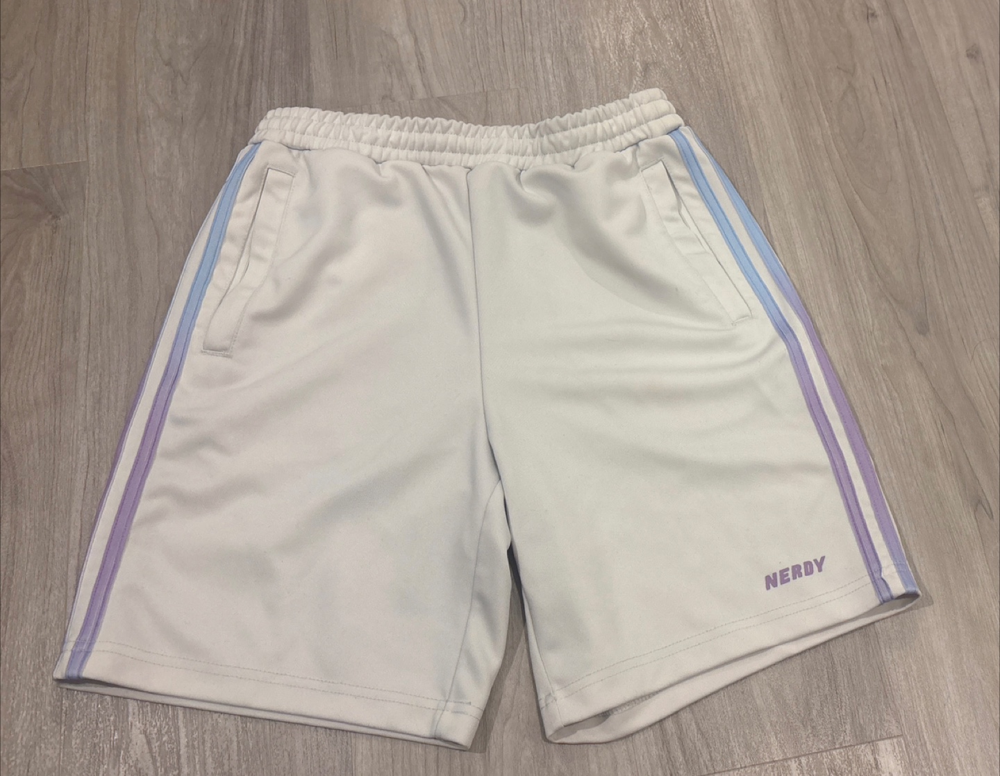 NERDY White Track Shorts with Purple/Blue Stripe Detail