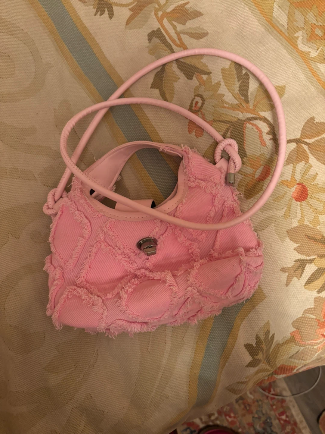 Pink textured shoulder bag