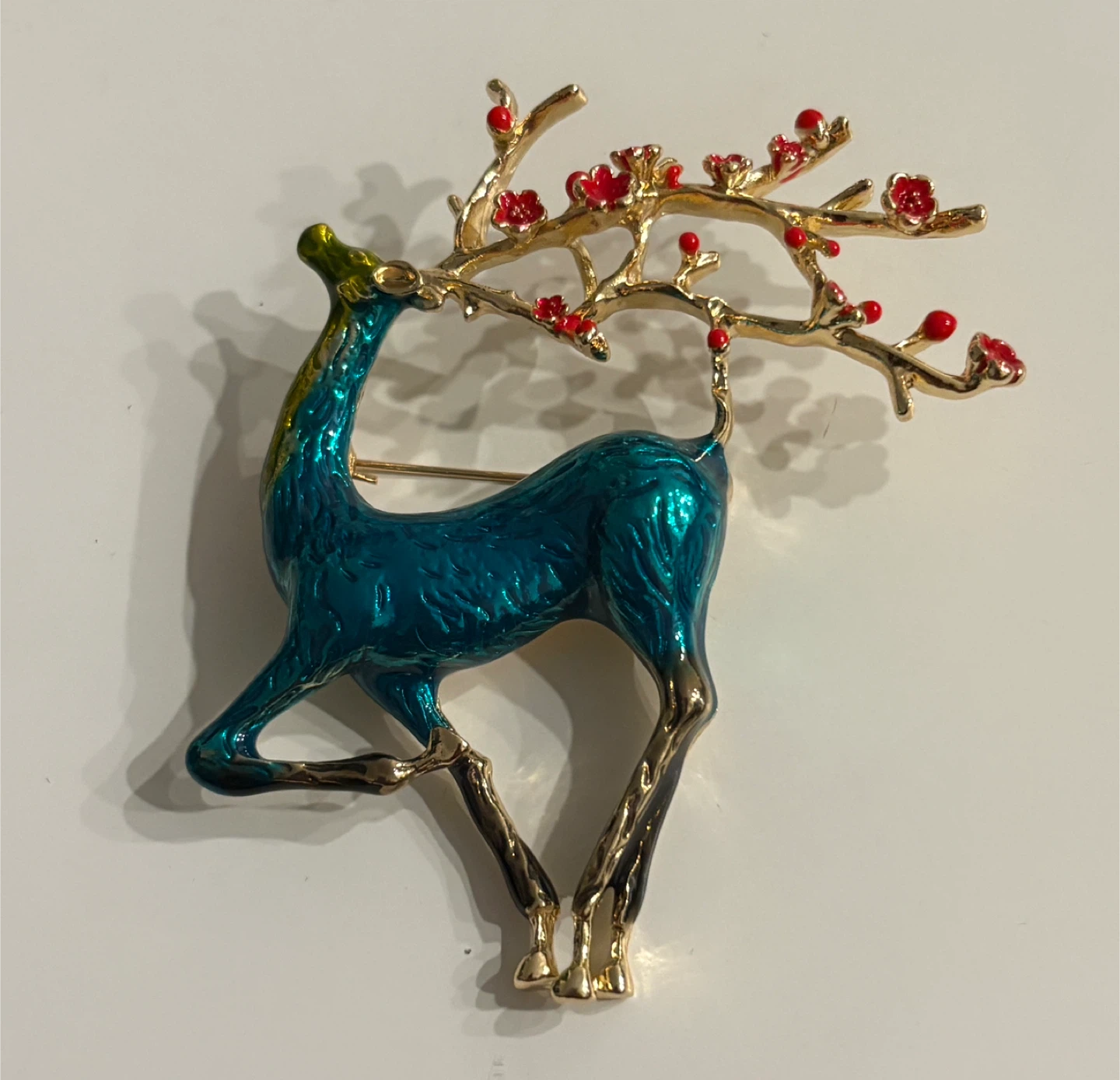 Beautiful Gold & Teal Reindeer Brooch with Red Flowers