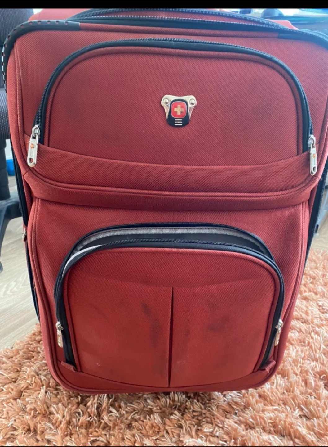 Red SwissGear Suitcase