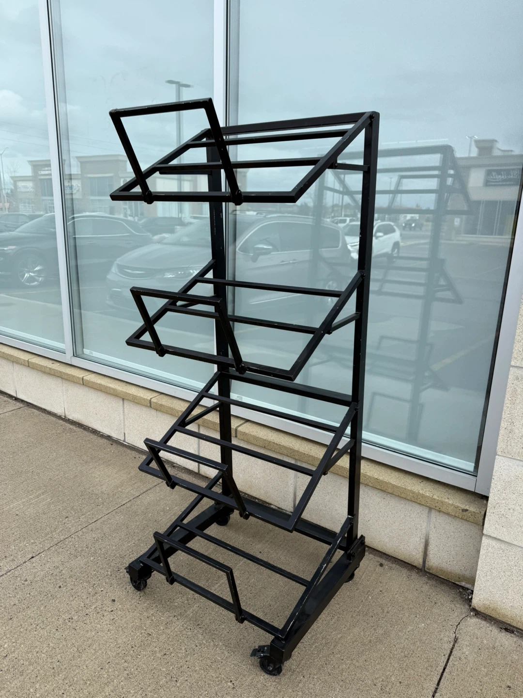 Black Metal Display Rack with Wheels