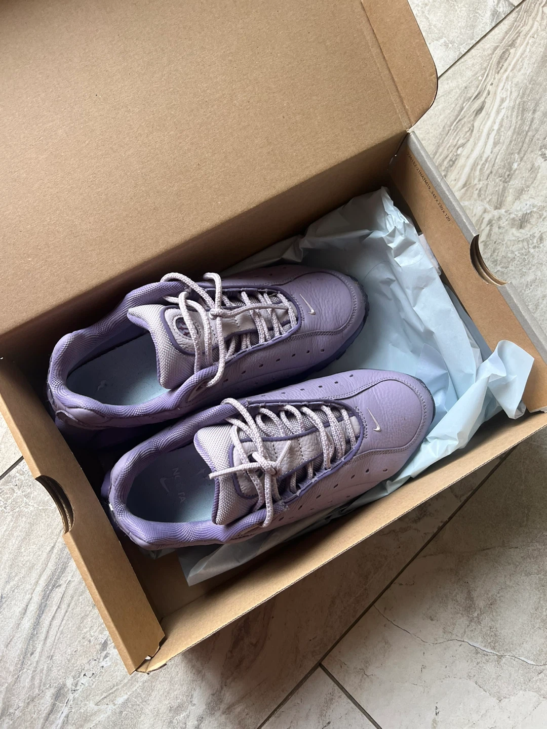 Nike x NOCTA Hot Step Air Terra sneakers in the "Violet Haze”