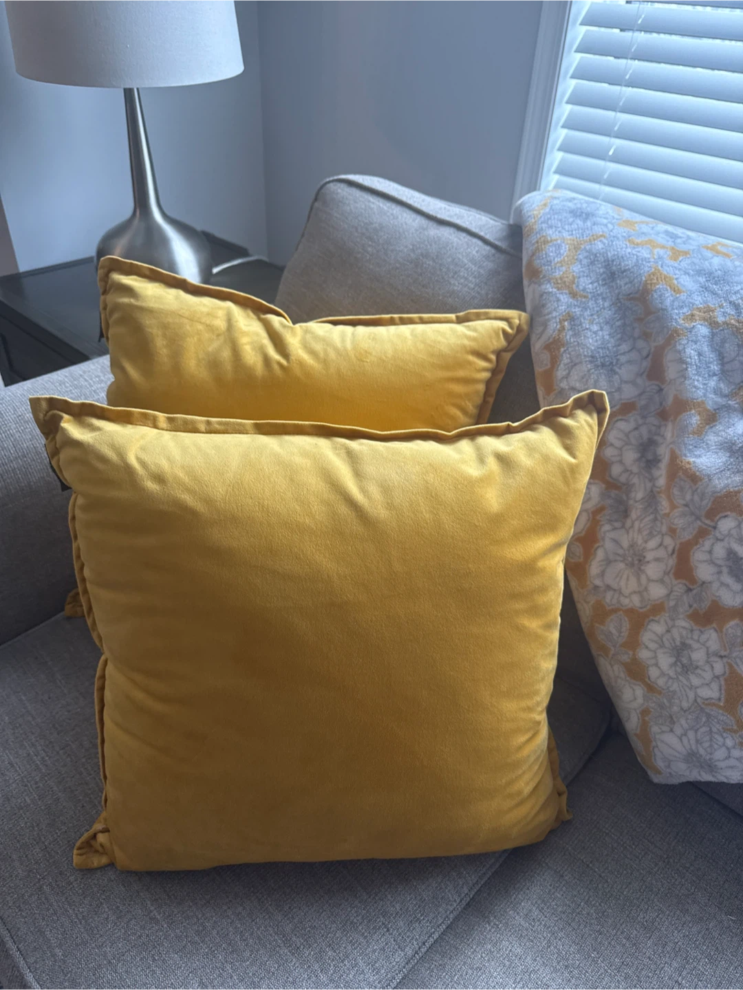 Two Yellow Velvet Throw Pillows