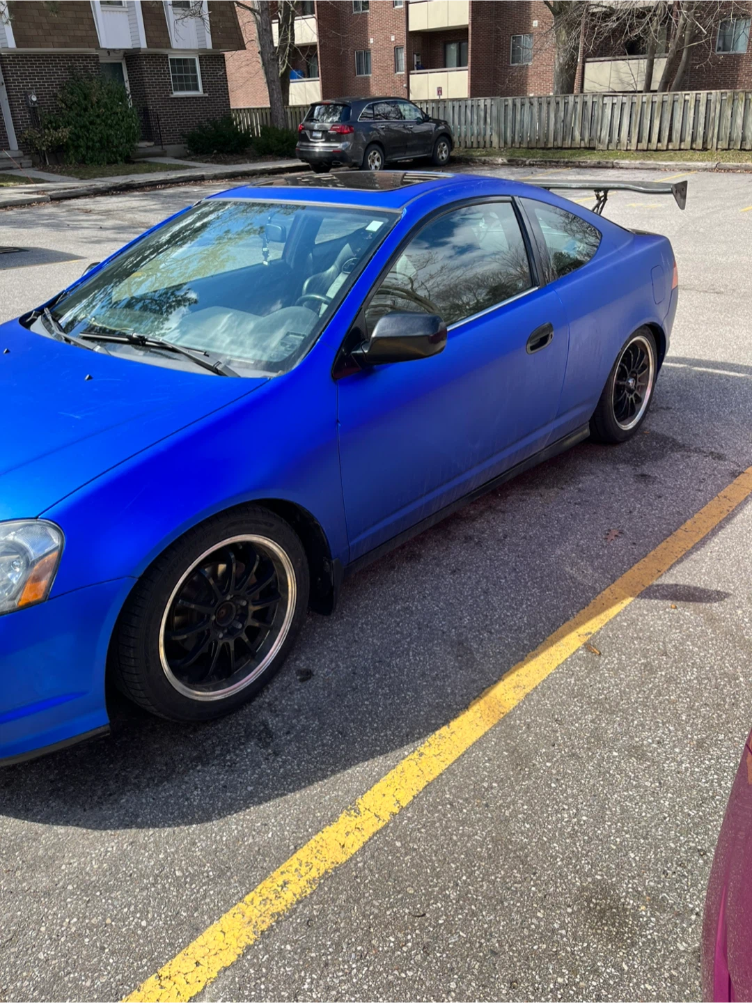 Blue Acura RSX Coupe with Spoiler - photo 3