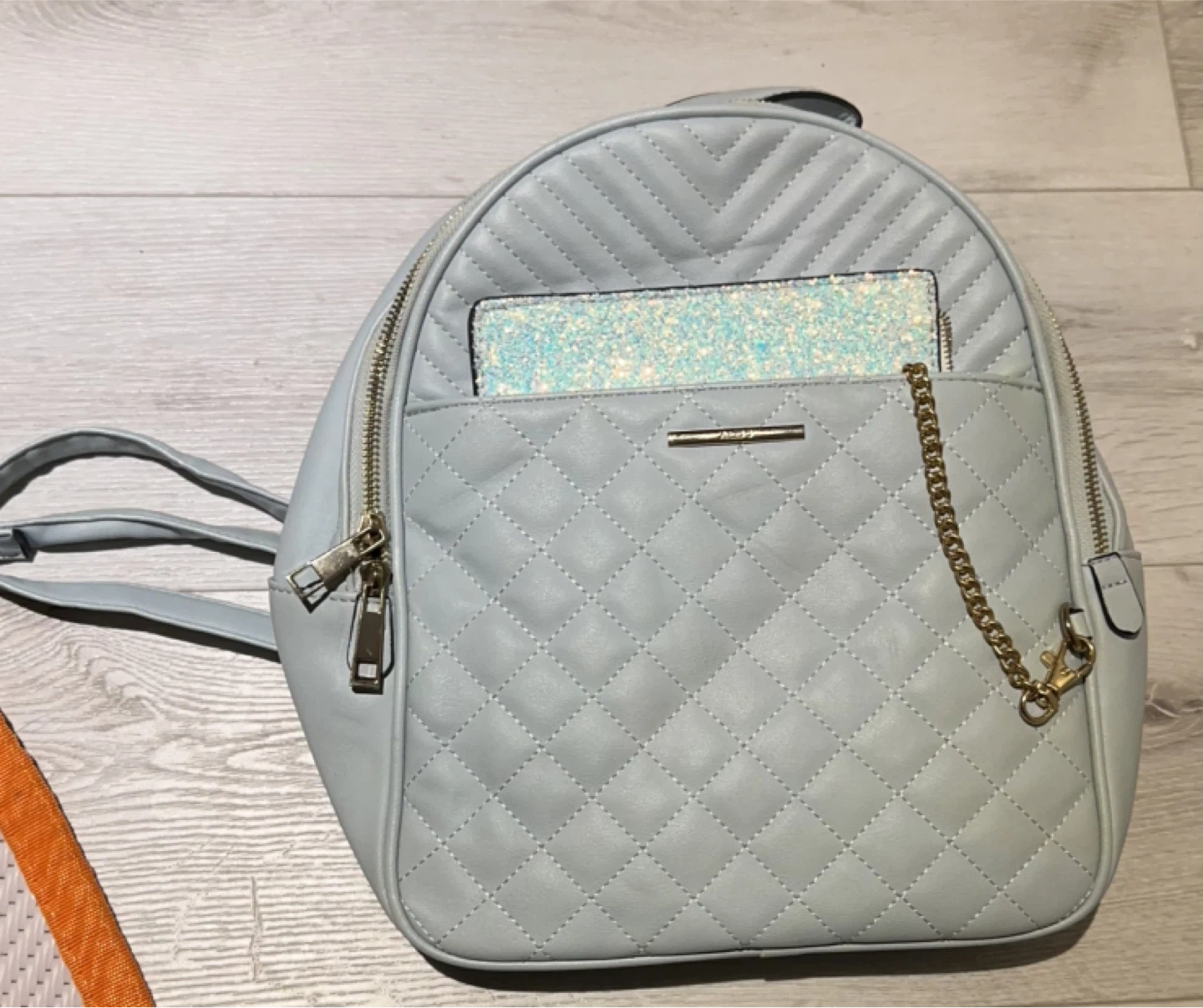 Aldo Light Blue Quilted Backpack with the removable