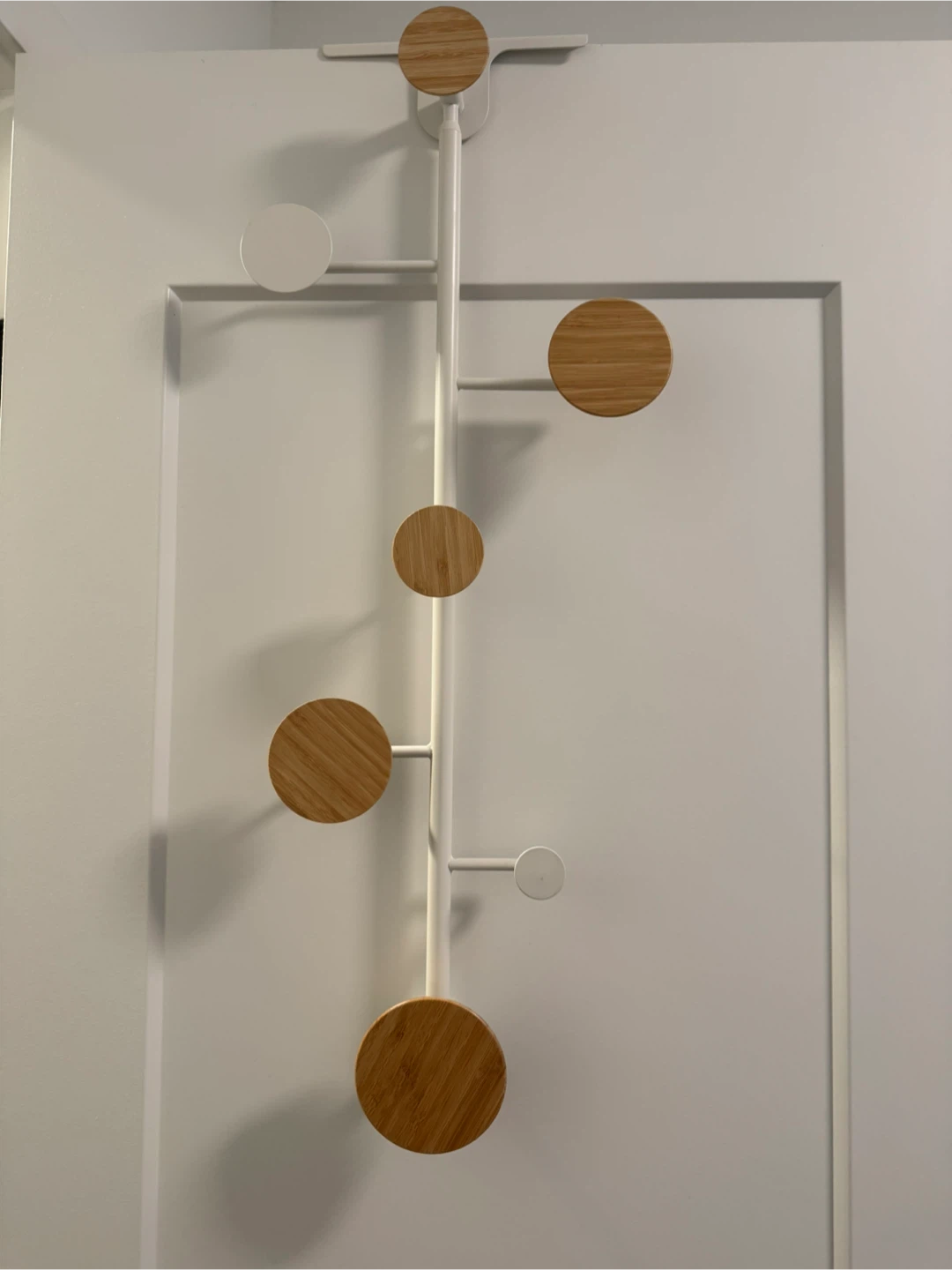 Over-the-door hook rack with wood accents