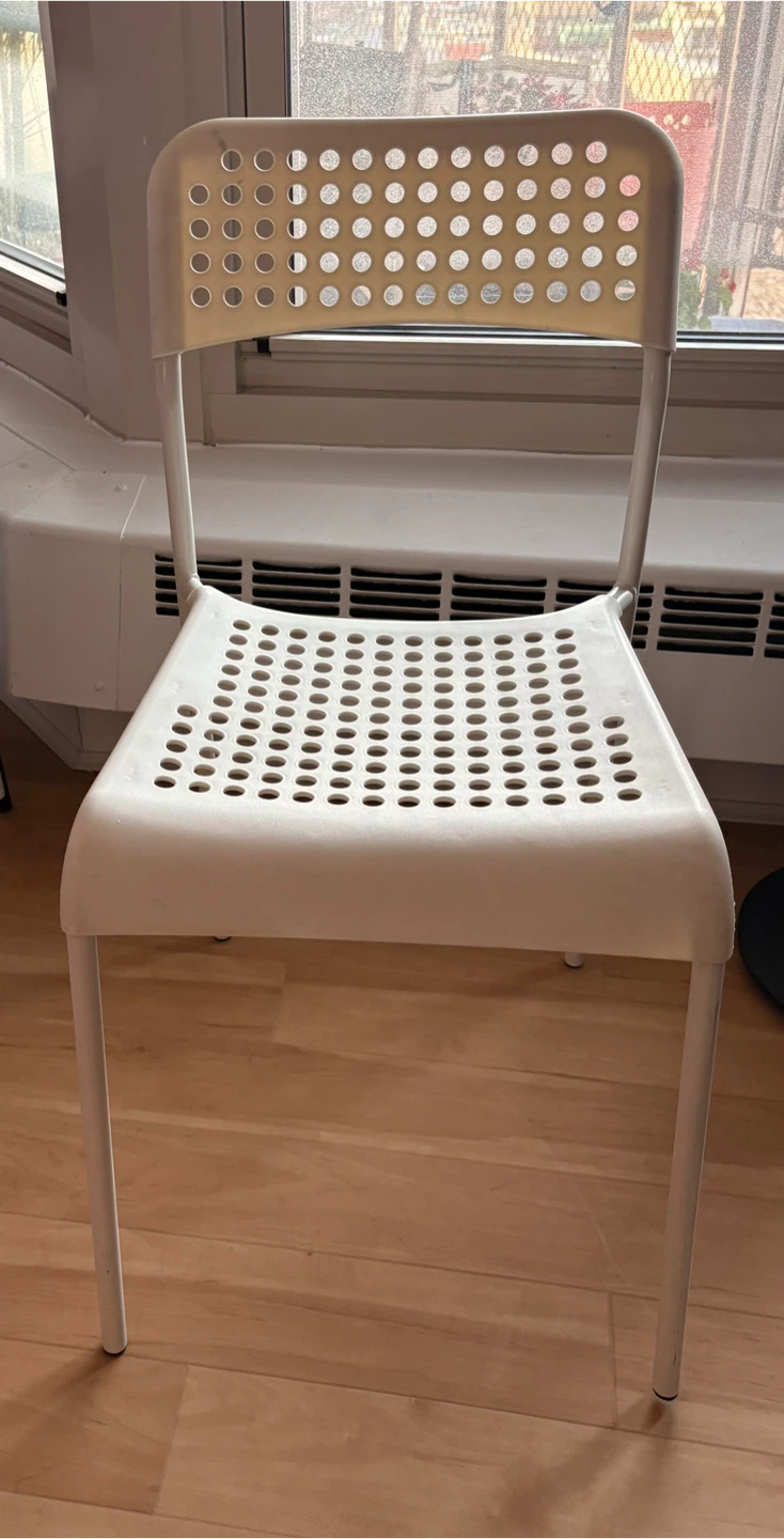 White IKEA Chair with Striped Seat Cushion