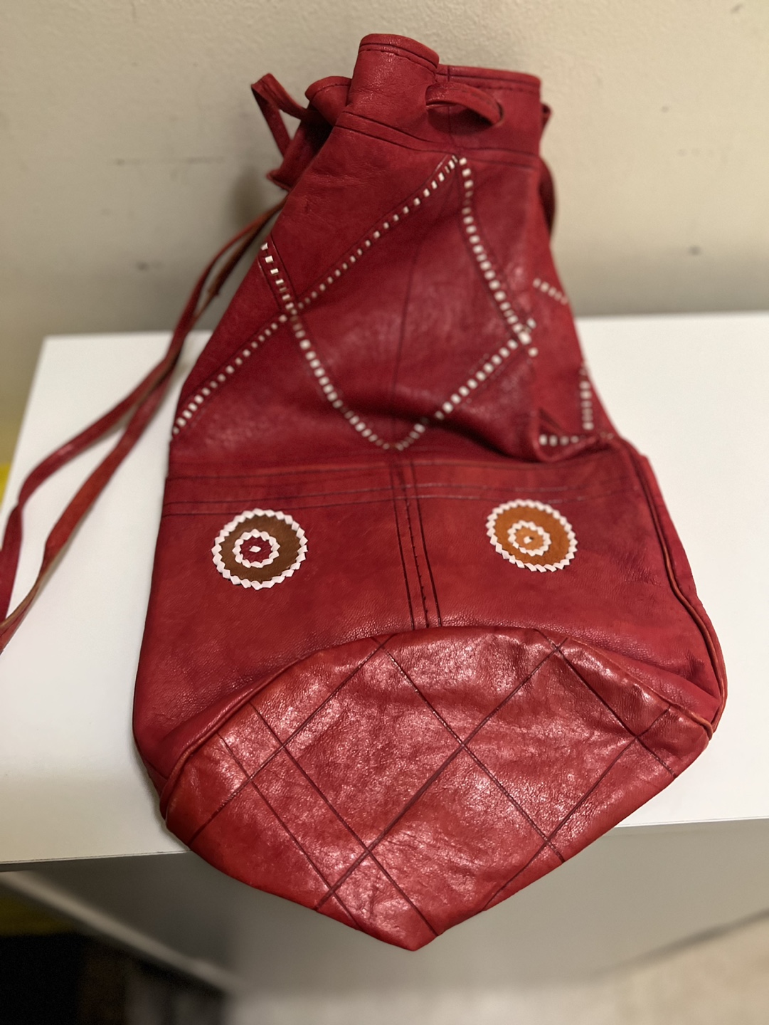 Red Leather Drawstring Bag with Decorative Stitching - photo 2