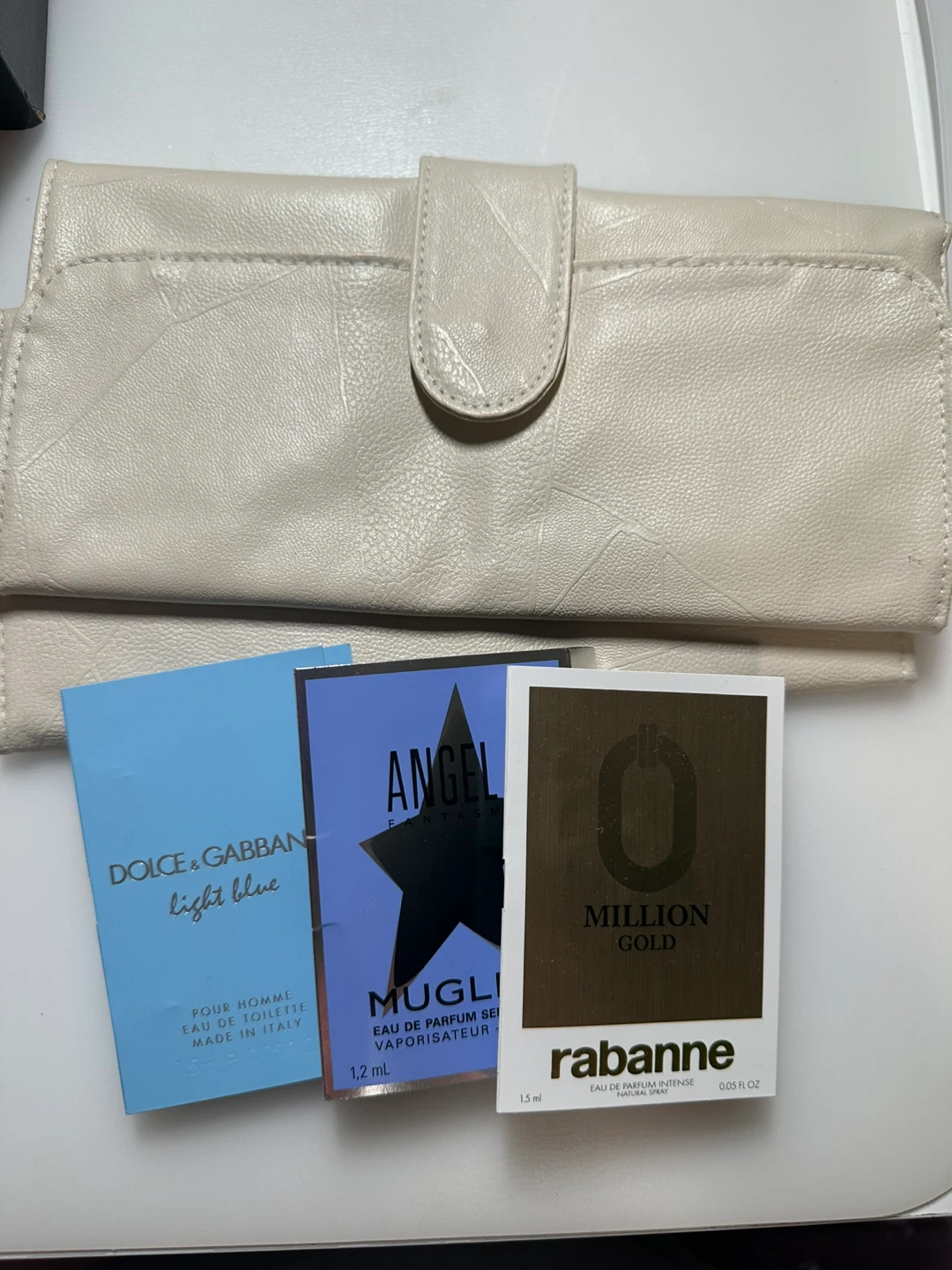 Two Cream Pouches for brushes and Fragrance Samples
