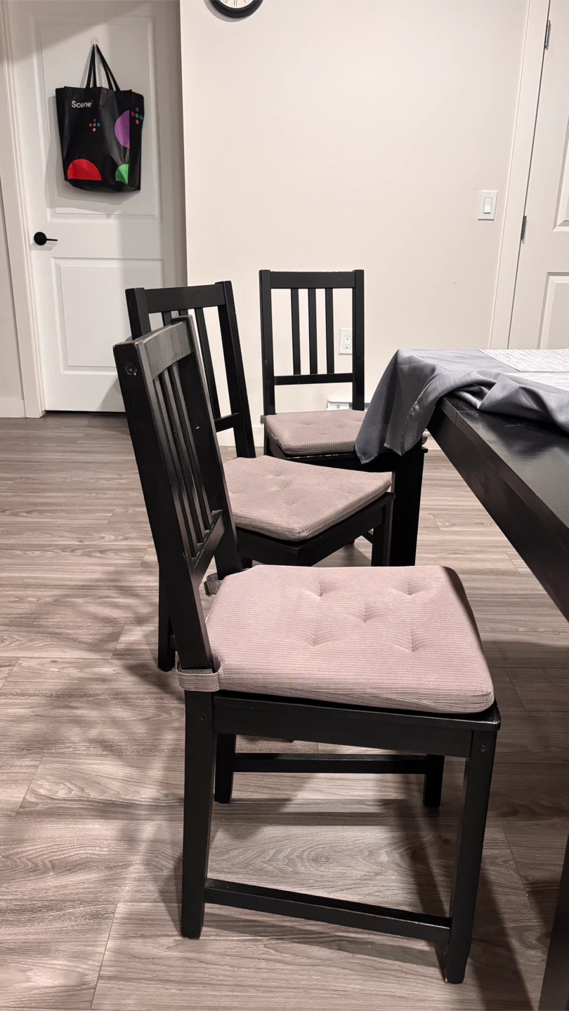 Four black dining chairs with grey cushions - photo 3