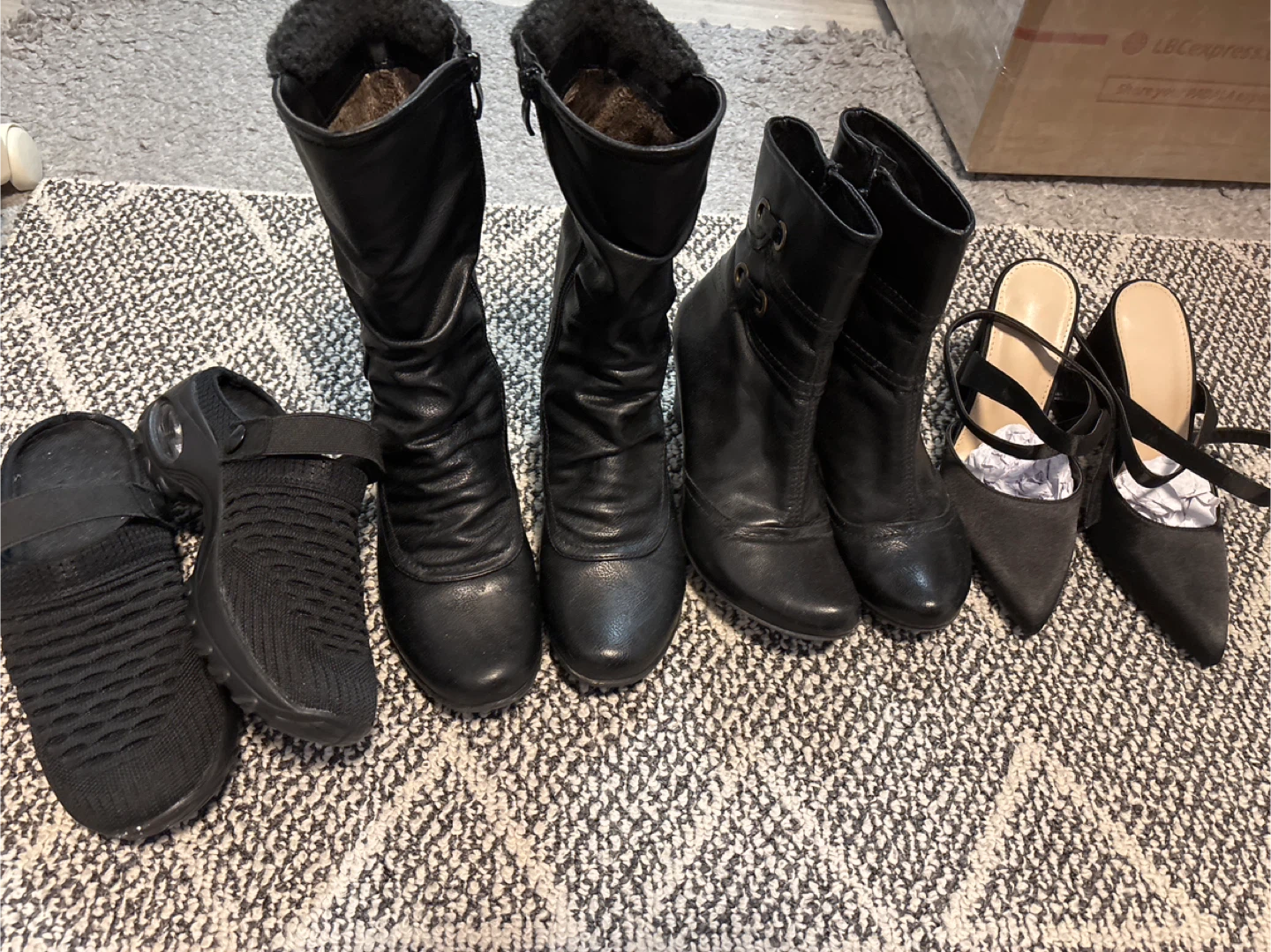 Bundle of black women's shoes - boots, heels, and clogs