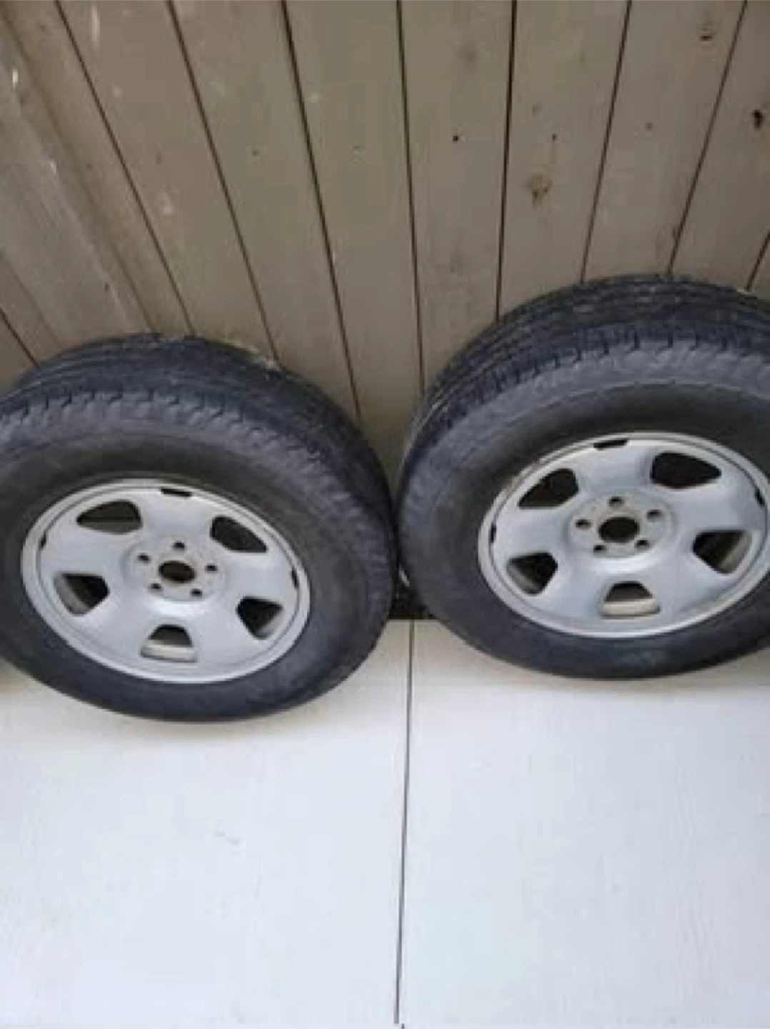 2 All Season Used Goodyear Tires On Steel Rims - 245/70/R17