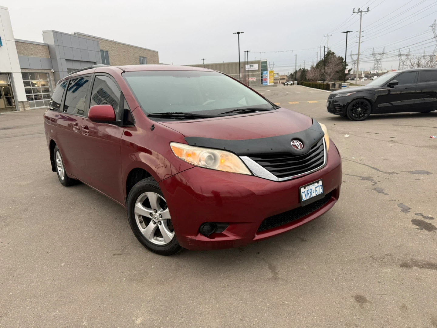 2011 Red Toyota Sienna LE Minivan