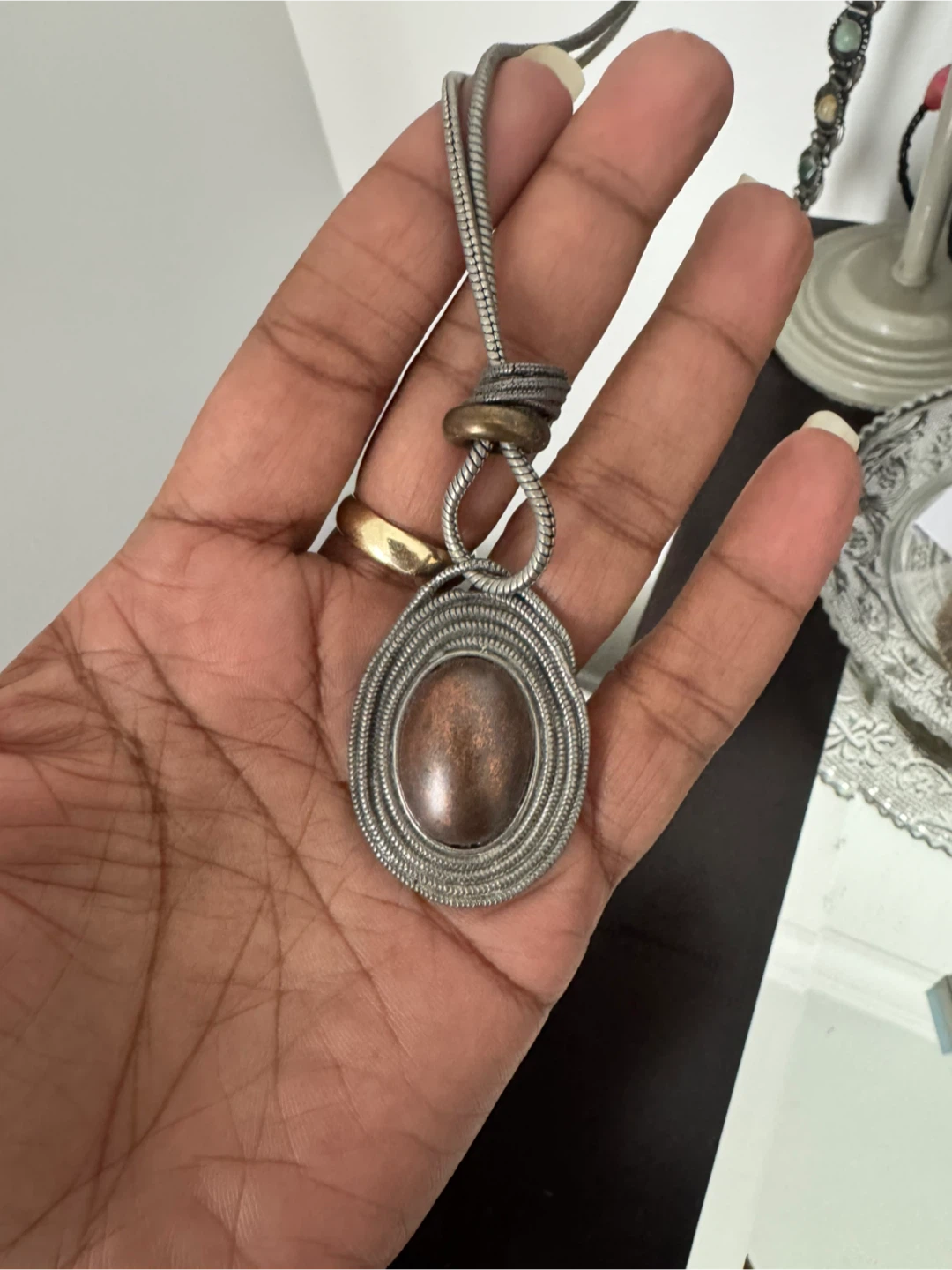 Wire-wrapped pendant necklace with brown stone