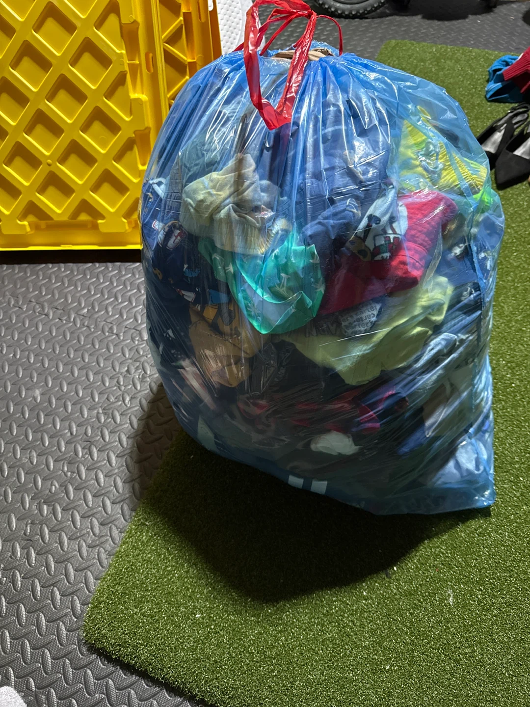 Bag of assorted kids' clothing