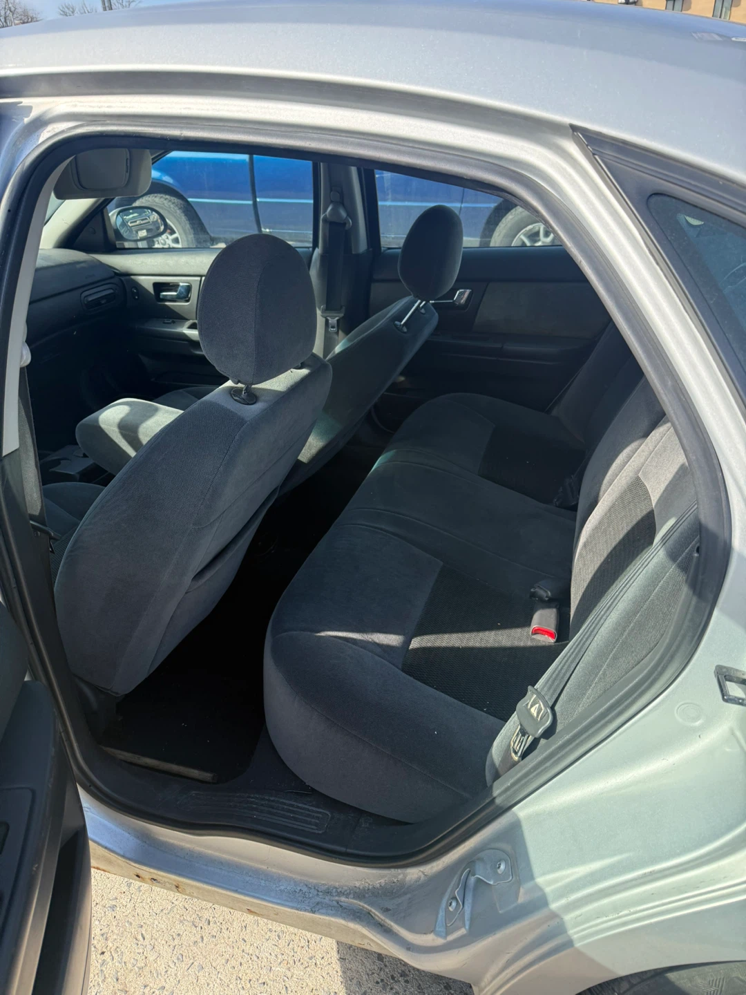 Silver Ford Taurus Sedan - photo 5