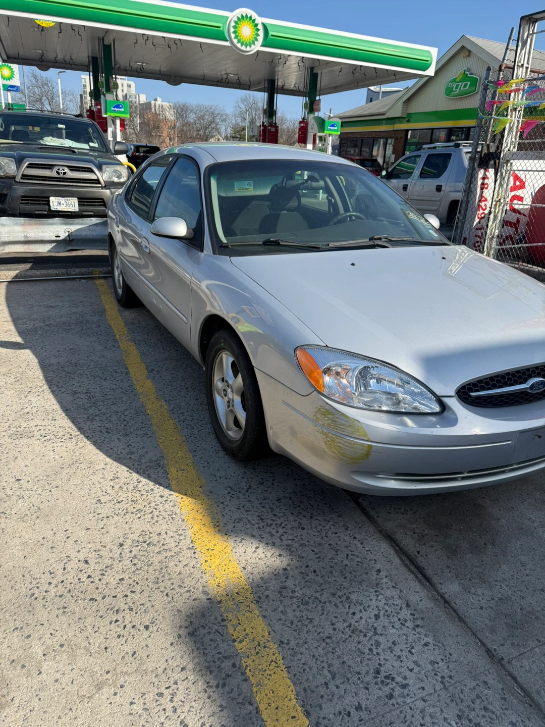 Silver Ford Taurus Sedan