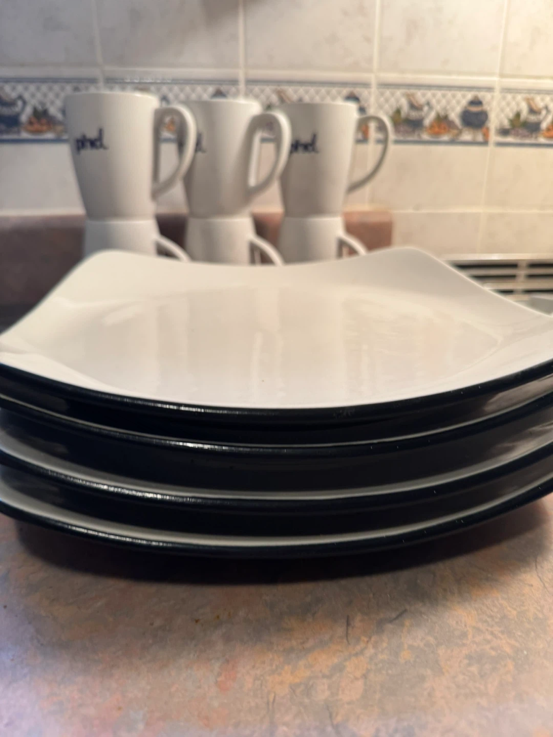 Designer dishes, coffee mugs