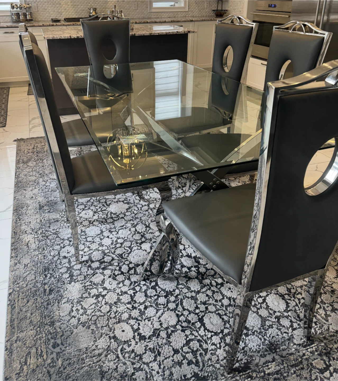 Glass Dining Table with 6 Black Chairs