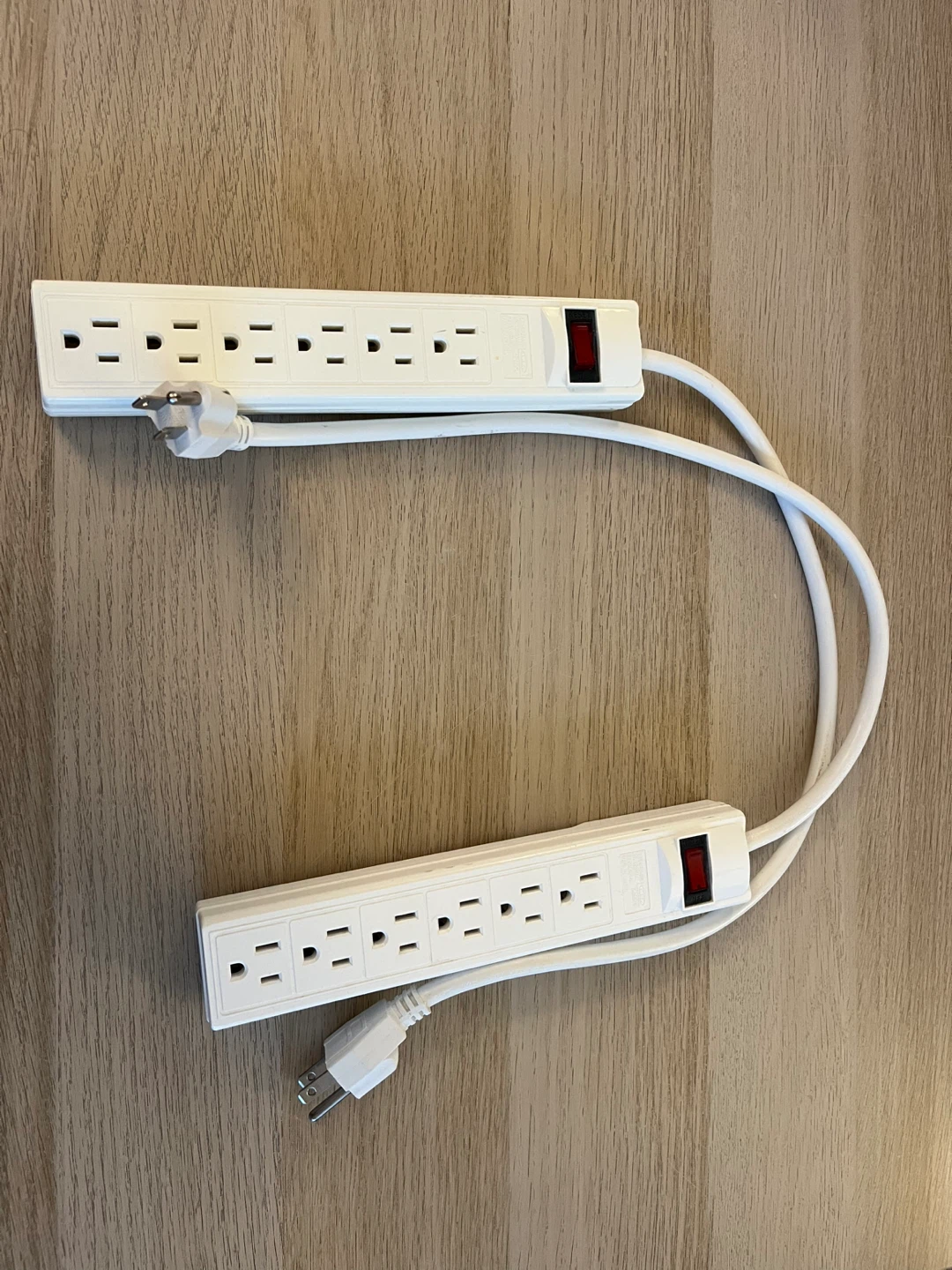 2 white 6-Outlet Power Strips with On/Off Switch