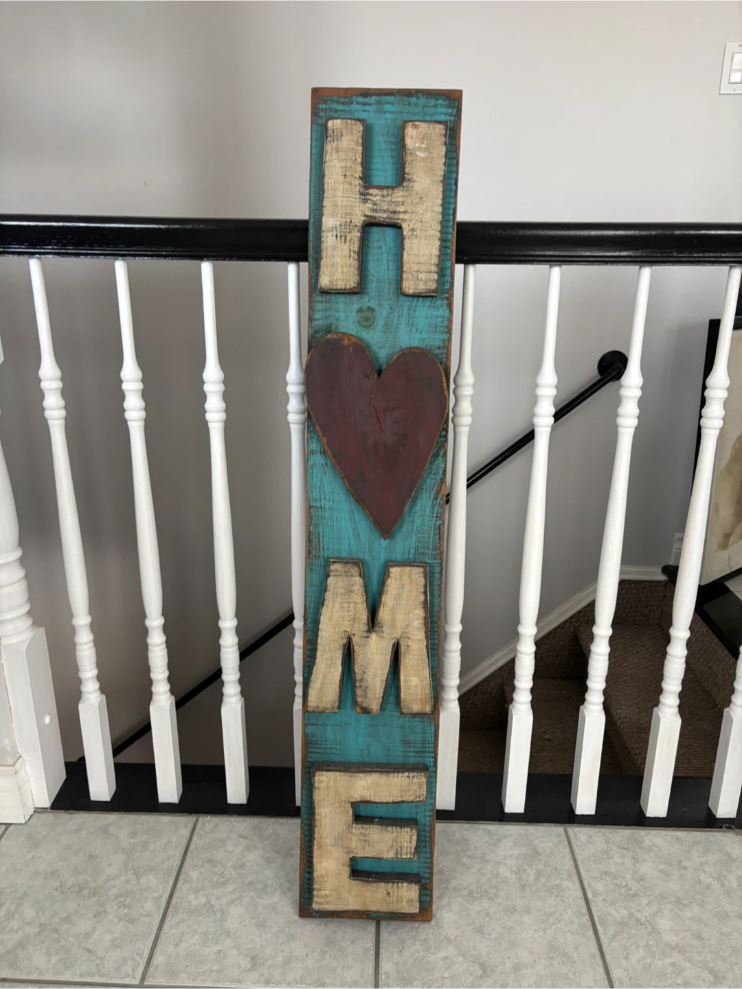 Wooden "HOME" sign with heart